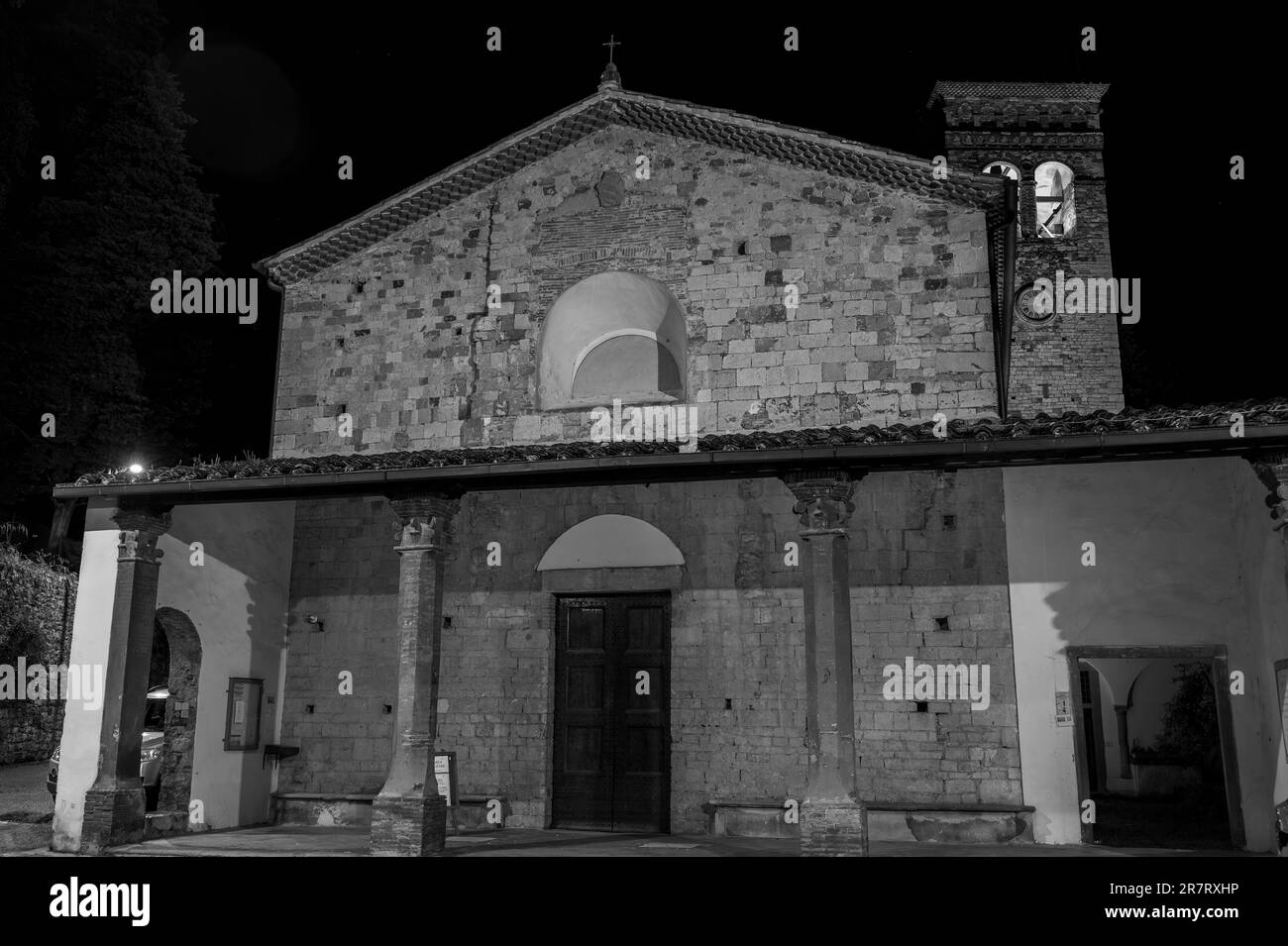 Built between 1085 and 1096, it was partially rebuilt in the XIII century. An elegant architraved portico with late medieval terracotta pillars leans Stock Photo