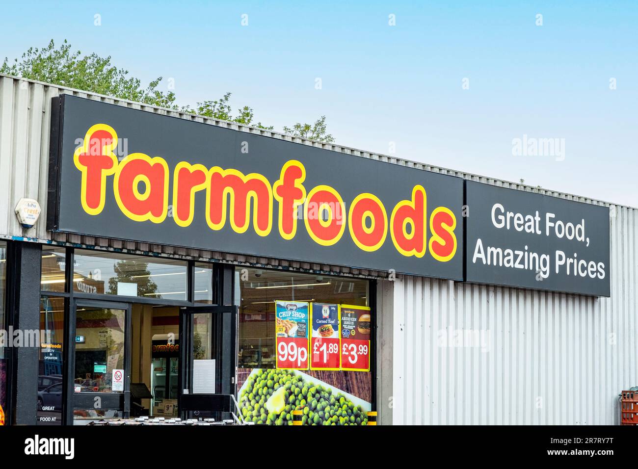 Close up of Farmfoods store sign on outside wall UK Stock Photo