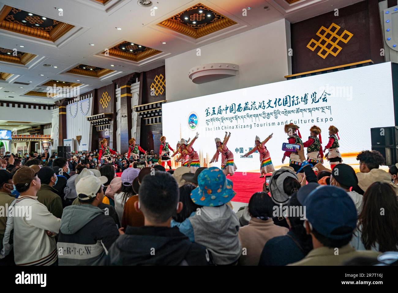 Lhasa, China's Tibet Autonomous Region. 17th June, 2023. Dancers perform during the 5th China Xizang Tourism and Culture Expo in Lhasa, southwest China's Tibet Autonomous Region, June 17, 2023. The 5th China Xizang Tourism and Culture Expo opened here on Friday. The three-day expo is one of the most important events on Tibet's cultural calendar. Nearly 1,000 businesses from home and abroad have attended the event, bringing about 10,000 different products. Credit: Sun Fei/Xinhua/Alamy Live News Stock Photo