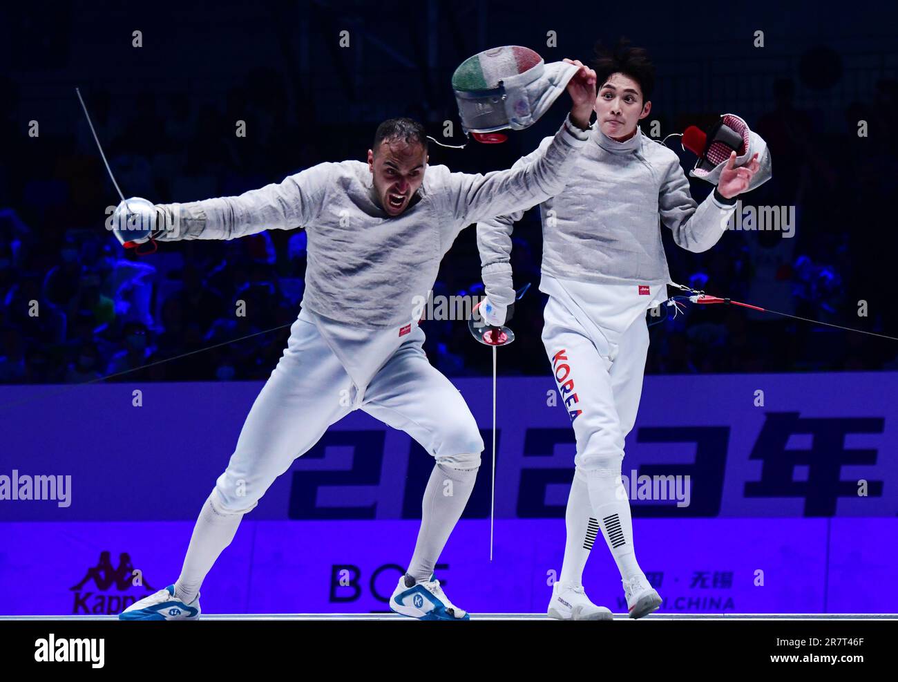 Wuxi. 17th June, 2023. Iran's Ali Pakdaman (L) celebrates victory after