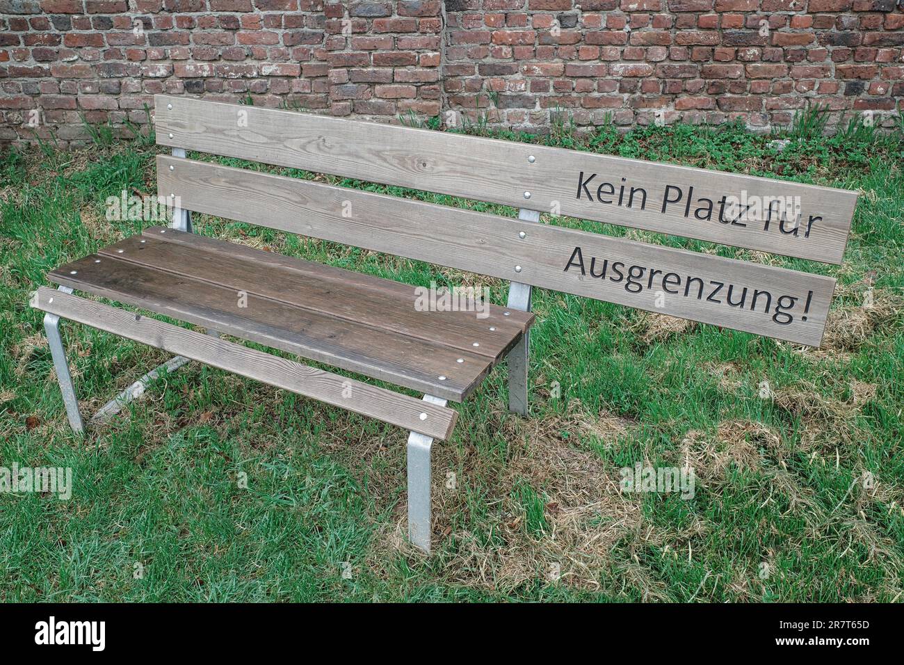 Bench with inscription Kein Platz fuer Ausgrenzung, North RhineWestphalia, Germany Stock Photo