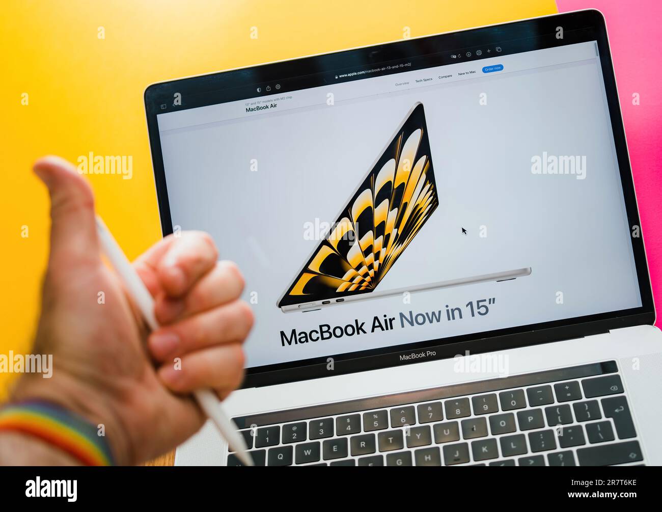 Paris, France - Jun 6, 2023: MacBook Air now in 15 inch - Creative room table with webpage of Apple on laptop showcasing latest device in new size - t Stock Photo