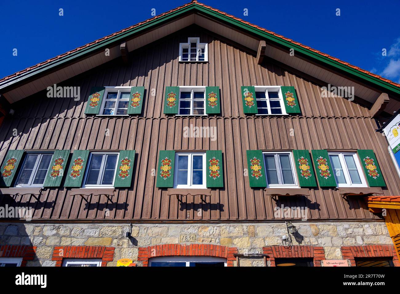 Facade with green shutters, cheese dairy from 1896, Diepolz, Wiedemann Farm, Allgaeu, Bavaria, Germany Stock Photo