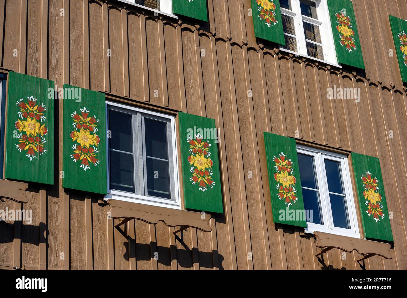 Green shutters painted with floral motifs, facade, cheese dairy from 1896, Diepolz, Wiedemann Farm, Allgaeu, Bavaria, Germany Stock Photo