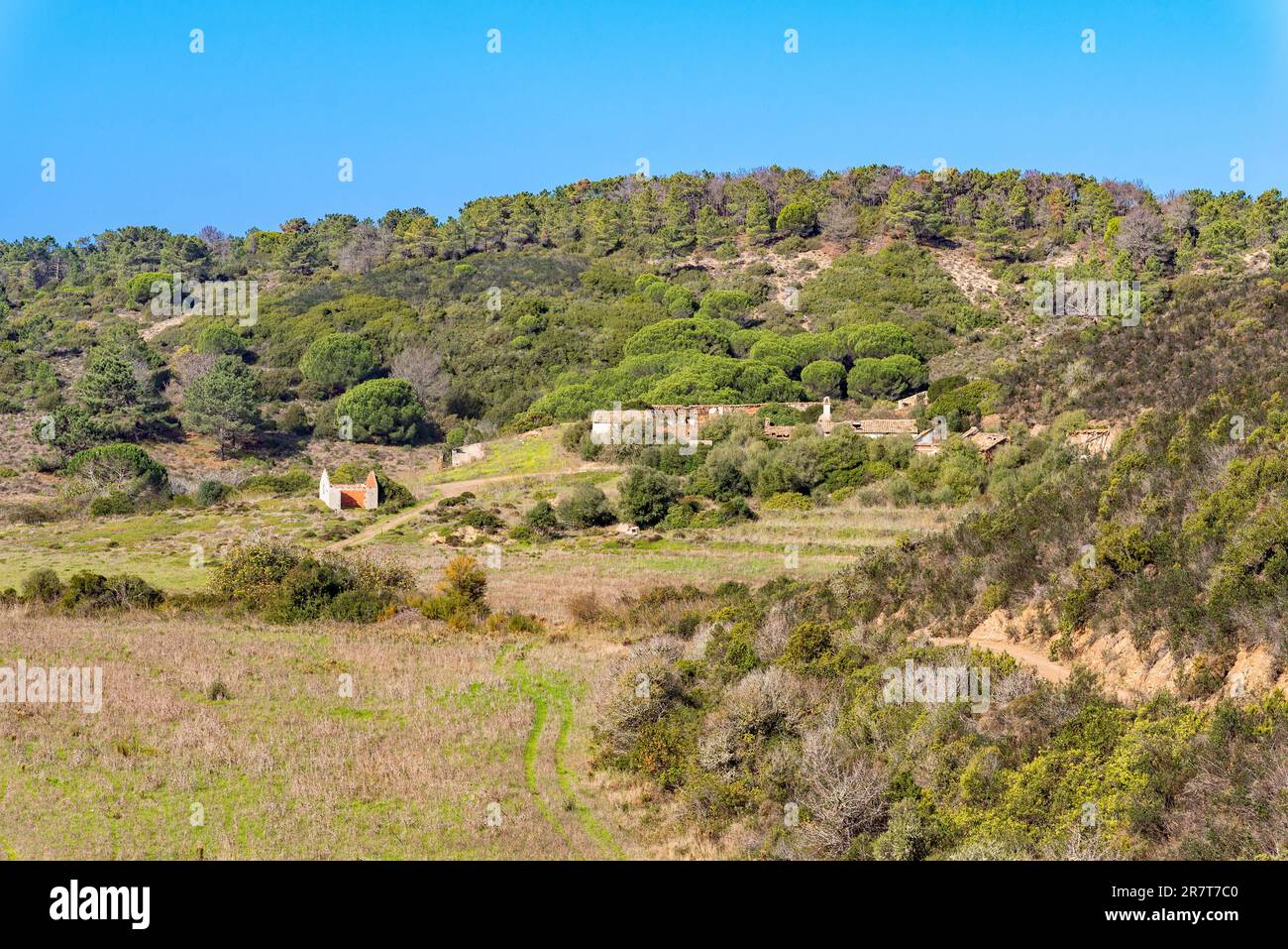 Abandoned village in the hilly landscape of the western Algavre near Aljezur in Portugal Stock Photo