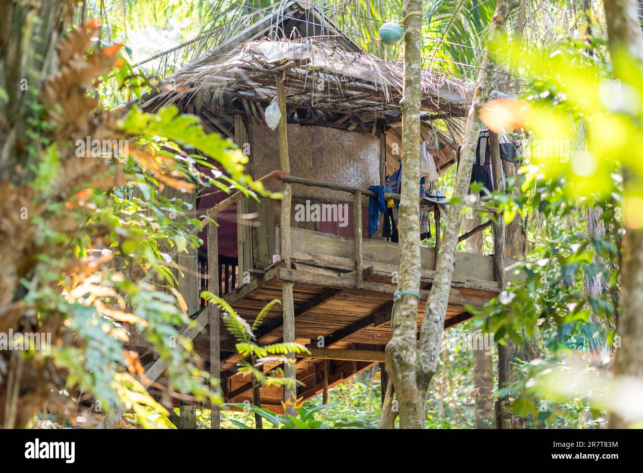 Stilt house on the hillside in the jungle, near the beach named Long Beach, in Thai Ao Yai, on the southwest side of the island of Ko Phayam Stock Photo