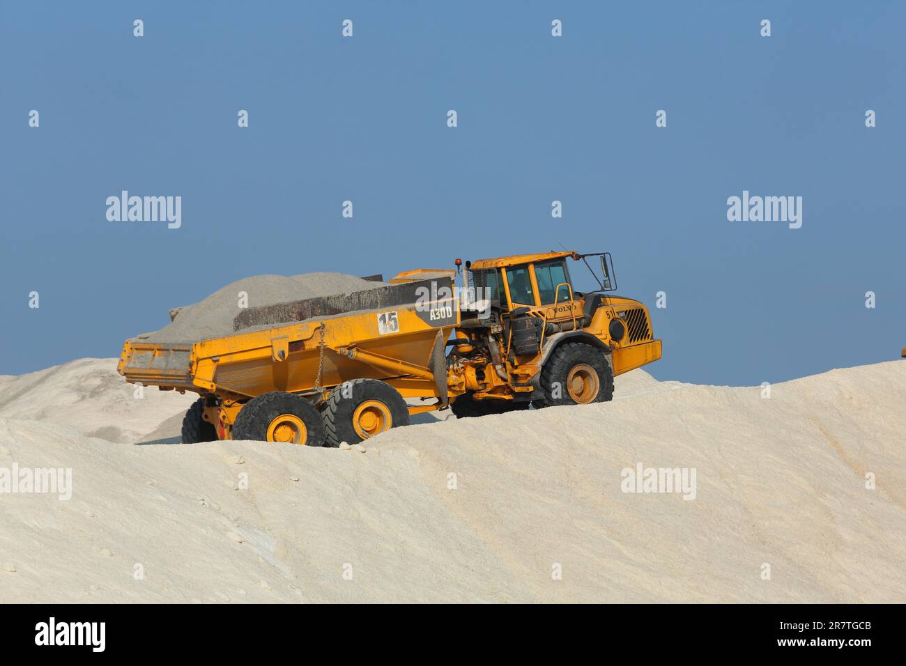 Dump truck on a salt mine for salt extraction, salt mining, salt