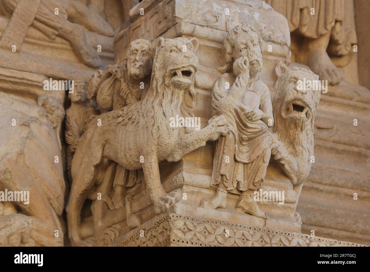 Sculptures Daniel in the Lion's Den, St-Trophime Cathedral, Place de la Republique, Imperial Square, Saint, stone, crafts, biblical, scene, figures Stock Photo
