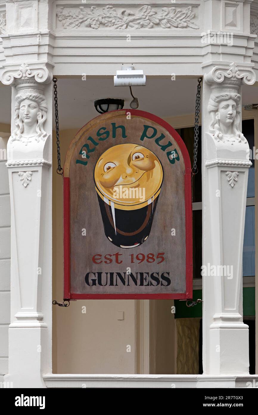 Advertising sign for Guiness beer in front of an Irish pub, Koblenz, Rhineland-Palatinate, Germany Stock Photo