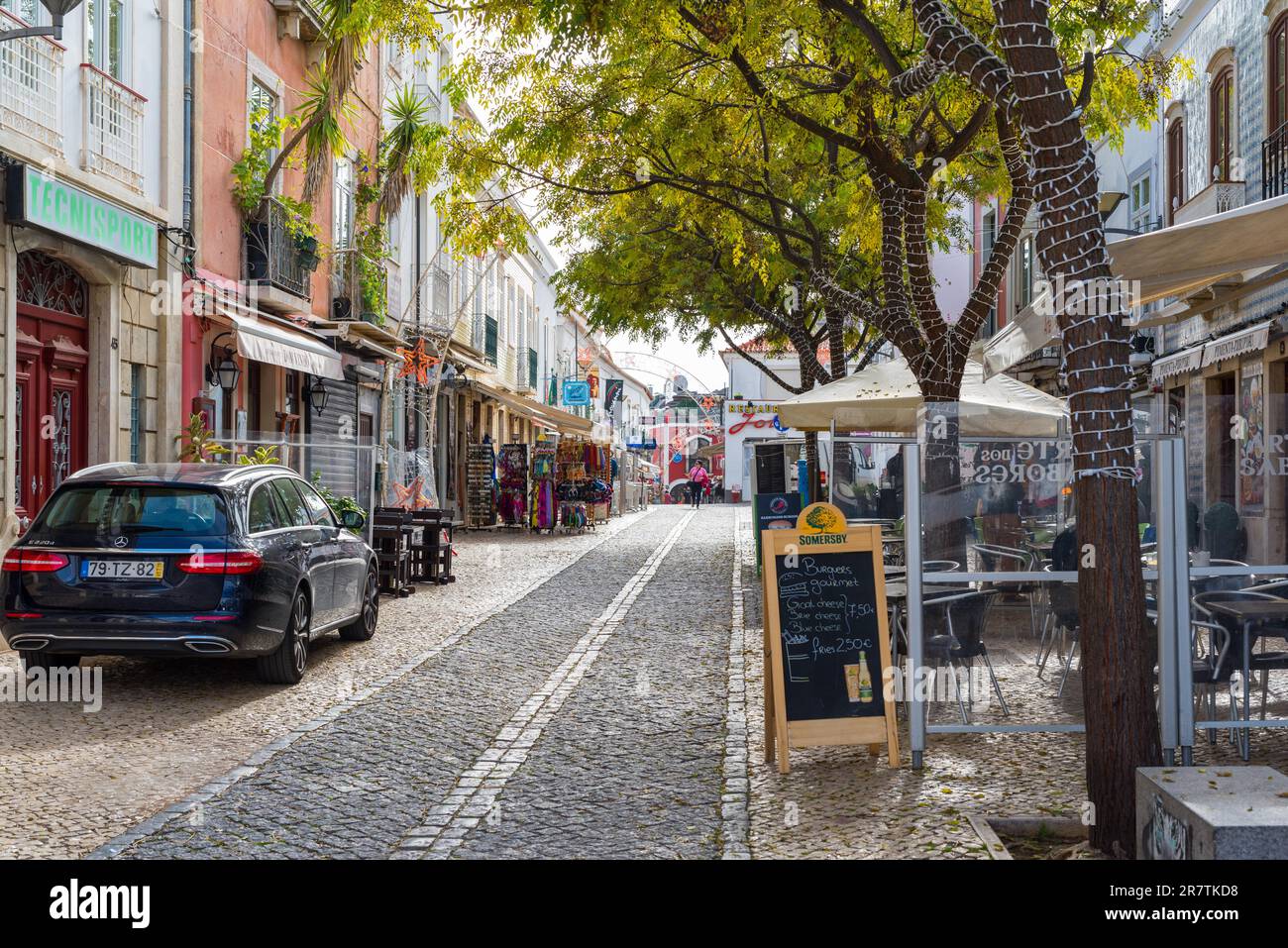 Street in the entertainment district, the the old town of Lagos with lots of gift shops and restaurants Stock Photo