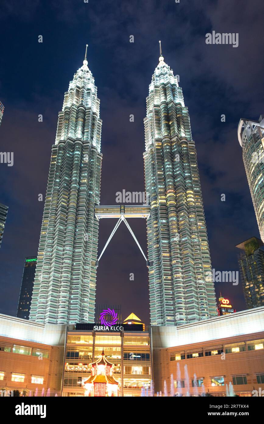 Night picture of illuminated Petronas Twin Towers, the main attraction and a landmark in capital of Malaysia Stock Photo