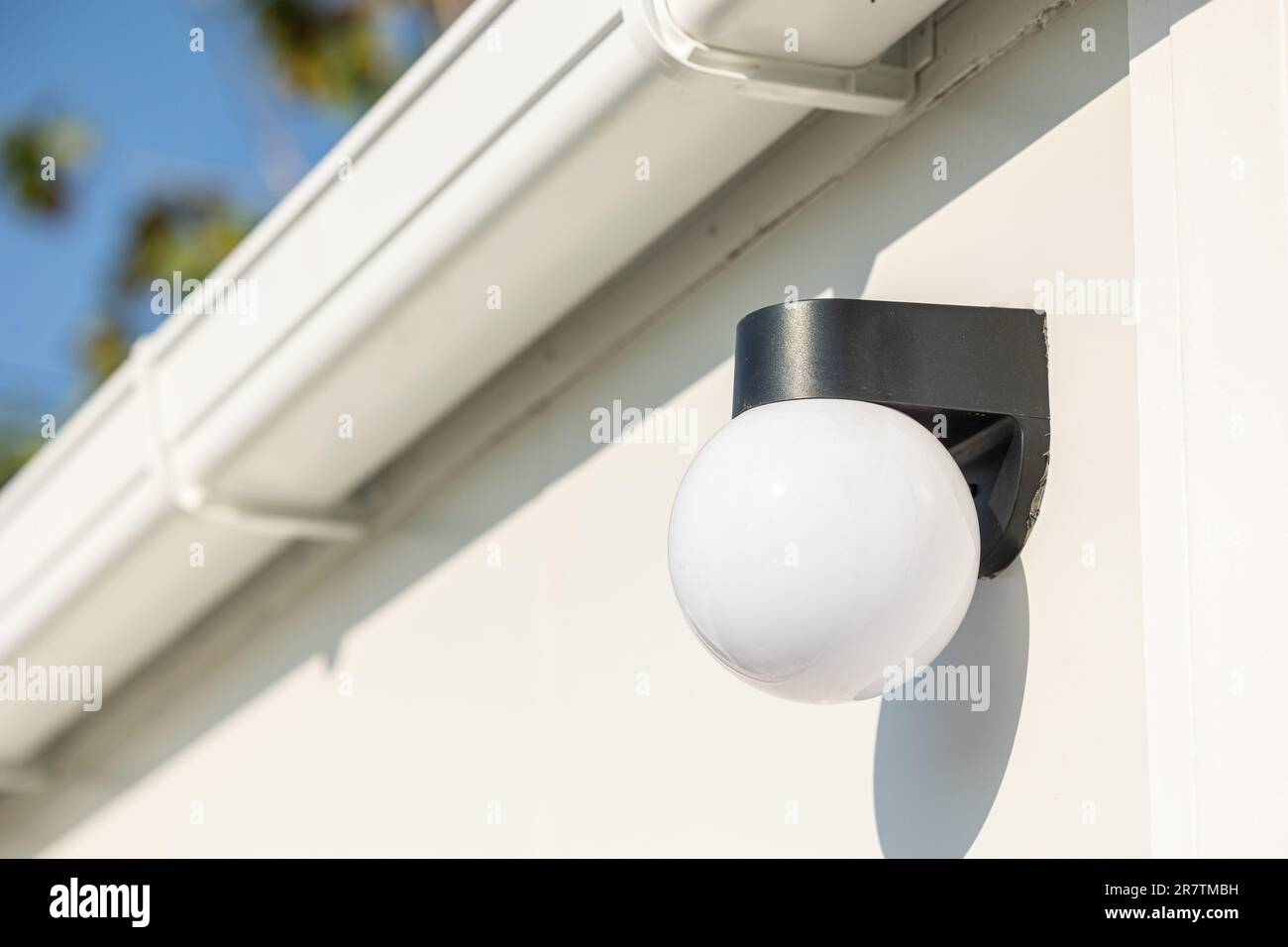Outdoor lighting lamp downlight wall mount modern dome ball design for office building. Stock Photo