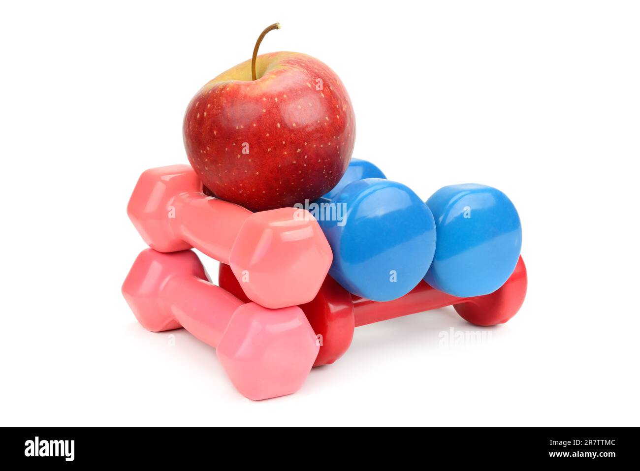 Set dumbbells and apple isolated on white background Stock Photo