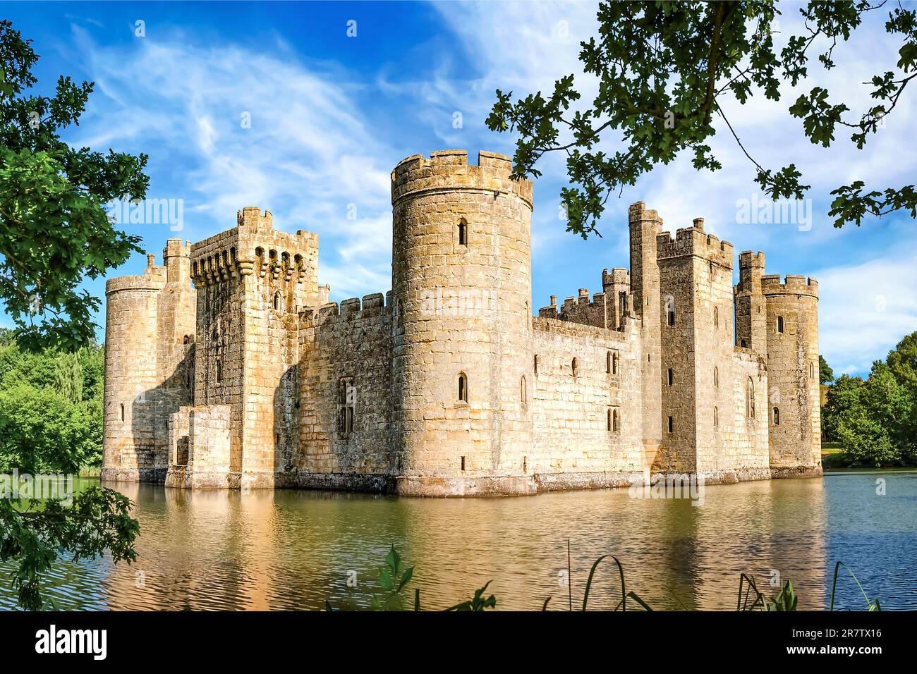 Sussex, United Kingdom - July 9, 2013: View of moated castle Bodiam near Robertsbridge on a sunny day. It was built in 1385. Stock Photo