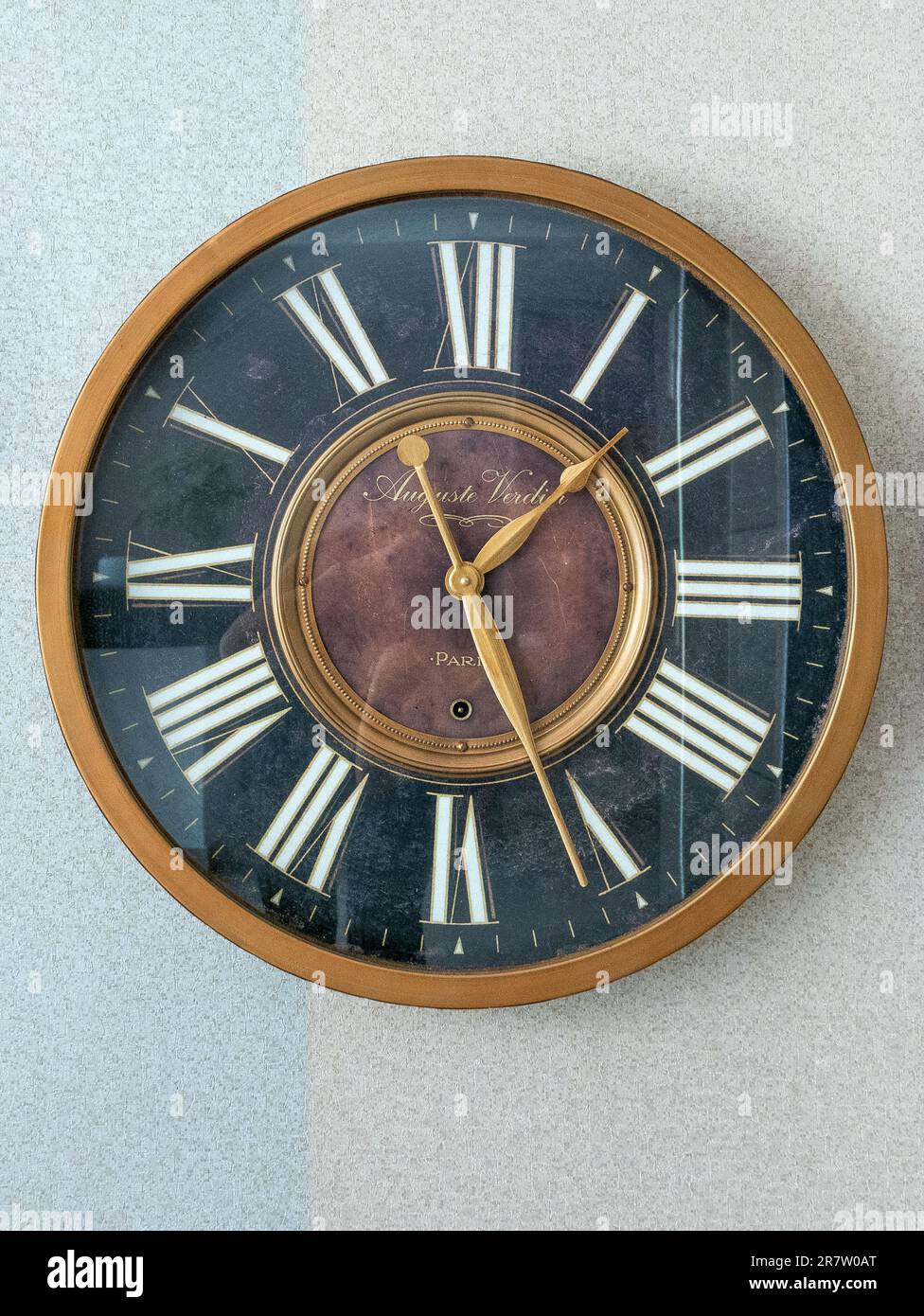 Medellin, Antioquia, Colombia - May 31 2022: Large Clock with Paris Time Zone on a White Wall Stock Photo