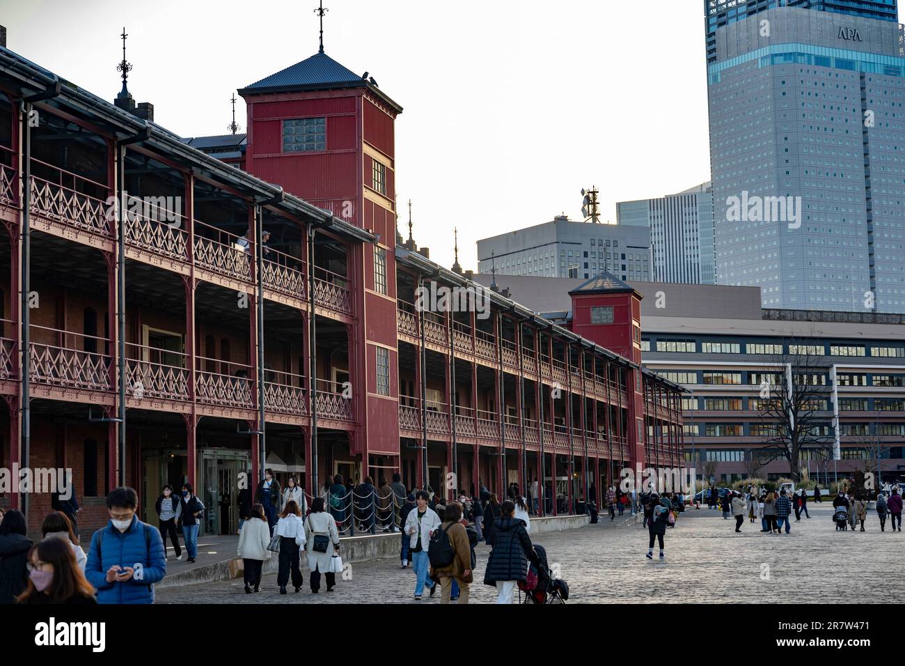 Yokohama, Kanagawa Prefecture, Japan. 23rd Feb, 2023. The Yokohama Red Brick Building, a vibrant community center with shops, restaurants and popup neighborhood activities.Minato Mirai is a vibrant waterfront district in Yokohama, Japan. It features iconic landmarks like the Yokohama Landmark Tower and Cosmo Clock 21, along with shopping malls, entertainment venues, and beautiful parks. (Credit Image: © Taidgh Barron/ZUMA Press Wire) EDITORIAL USAGE ONLY! Not for Commercial USAGE! Stock Photo