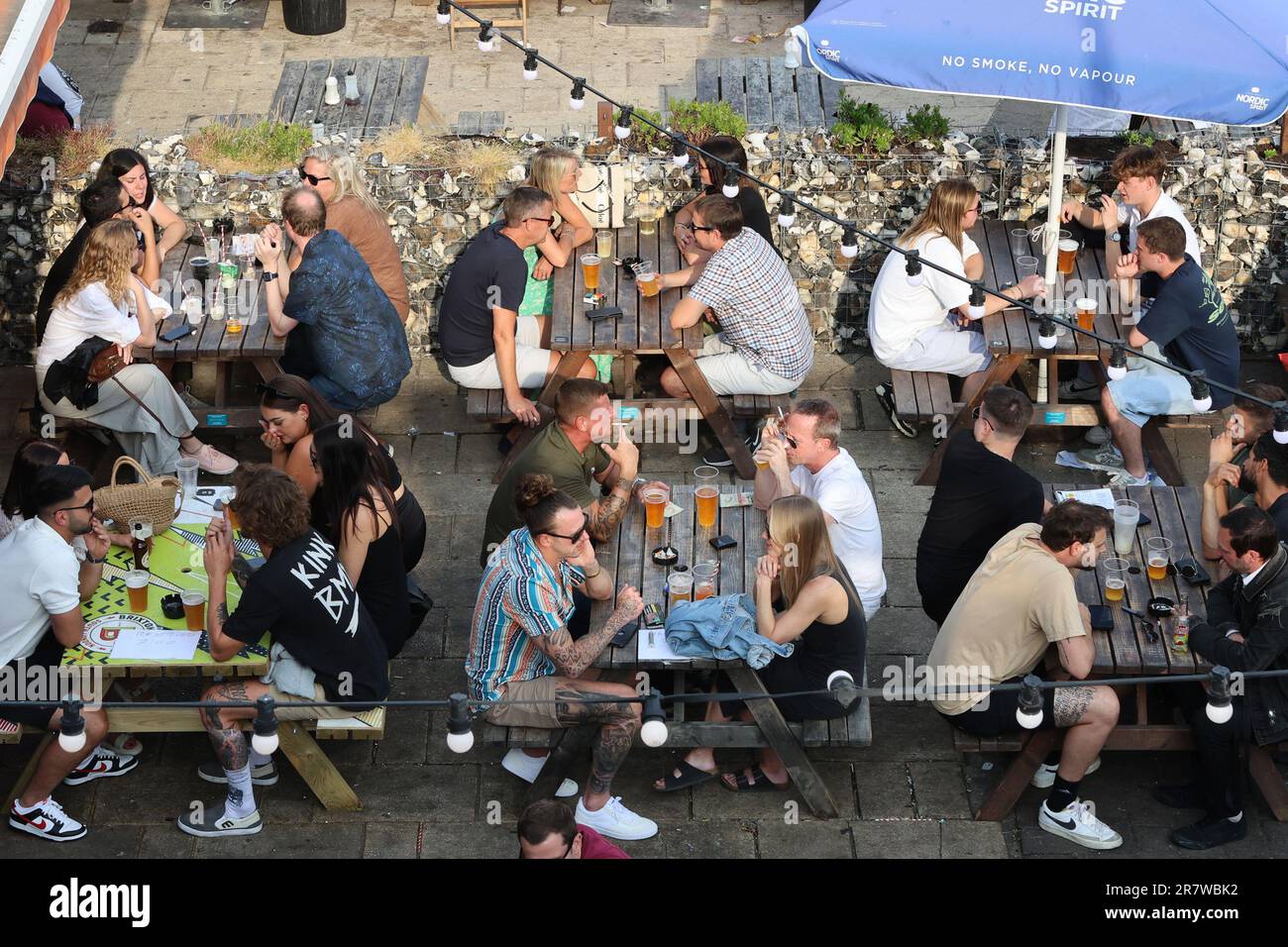 A busy bar on Brighton seafront during the summer Stock Photo