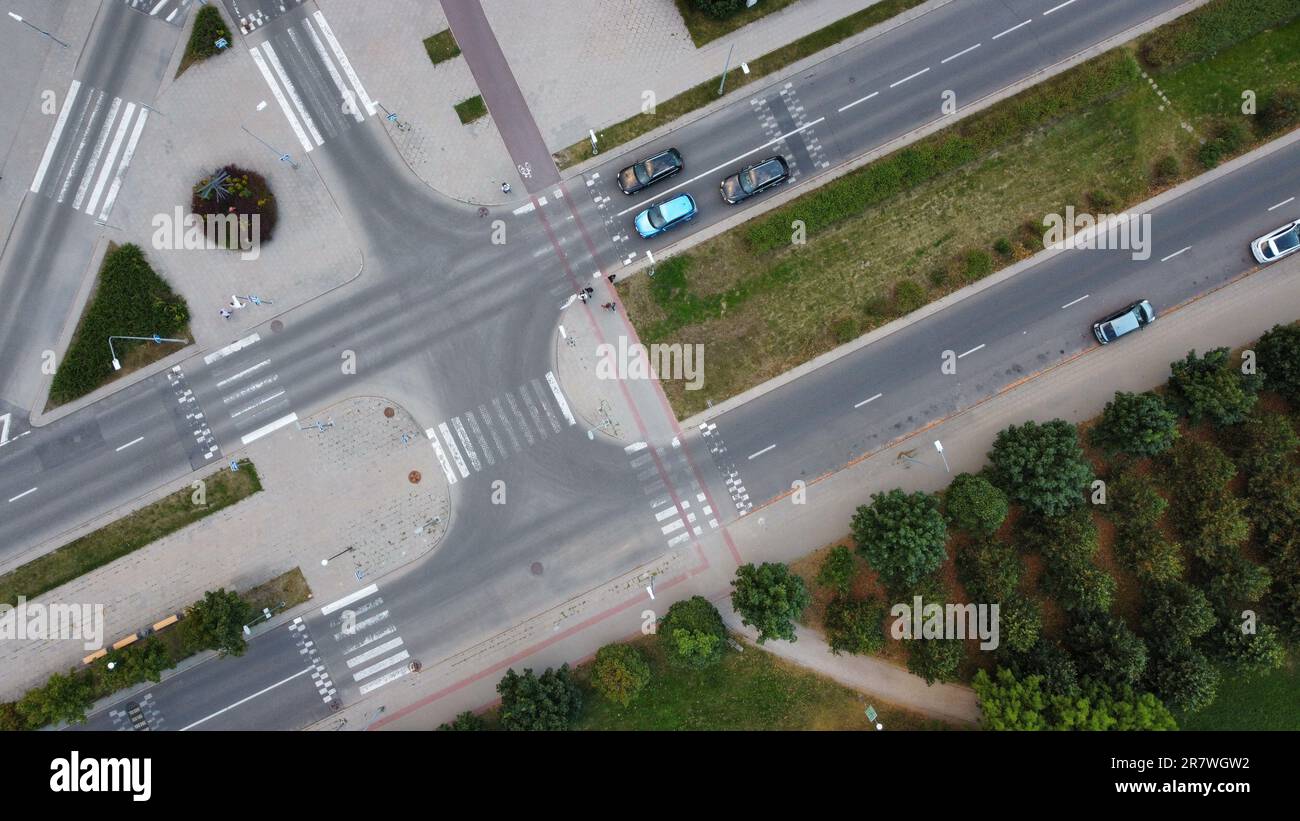 A areal view of a bustling intersection in the heart of a bustling city, featuring multiple lanes of traffic Stock Photo
