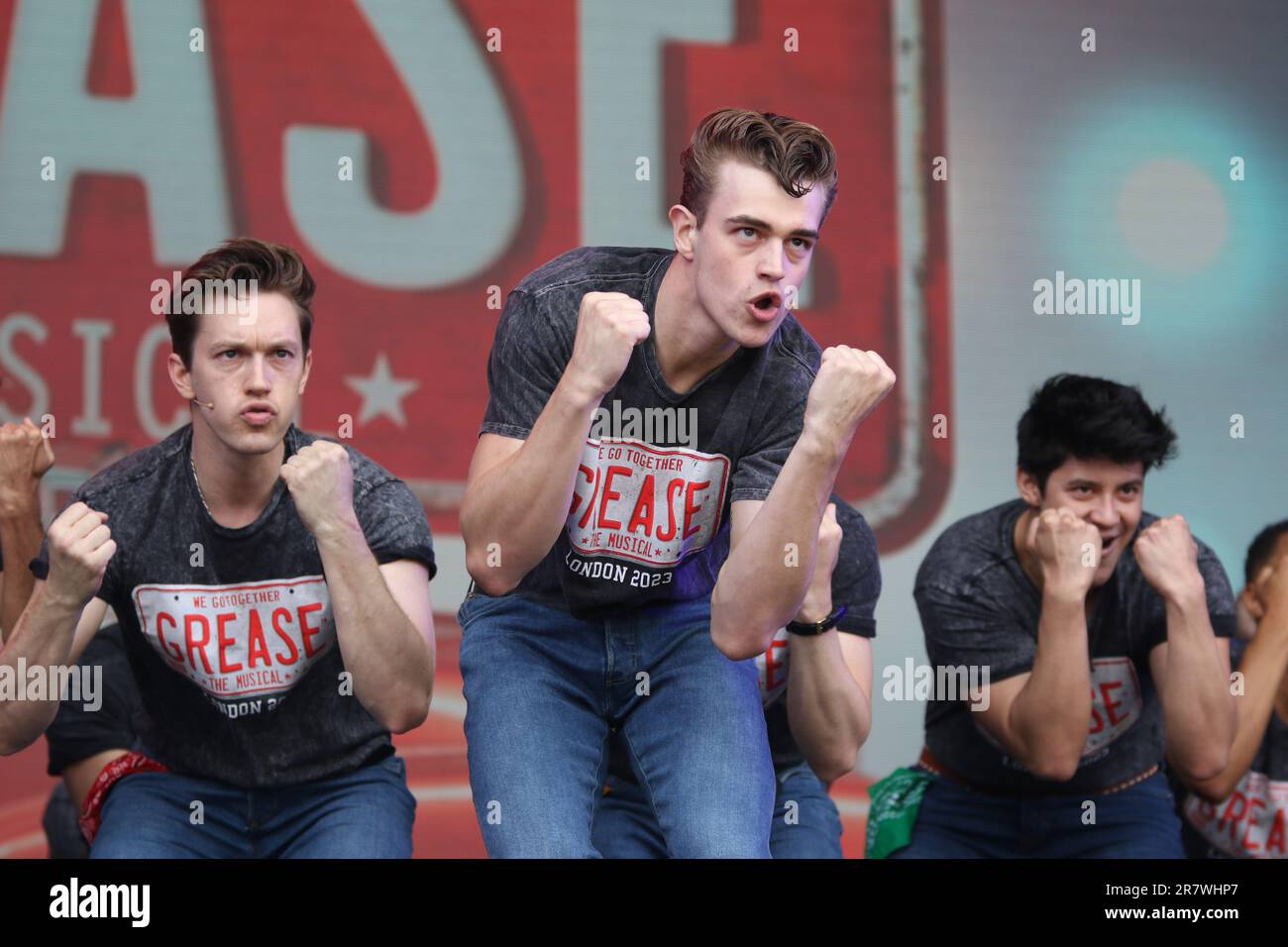 The cast of the musical Grease perform live on stage at West End Live