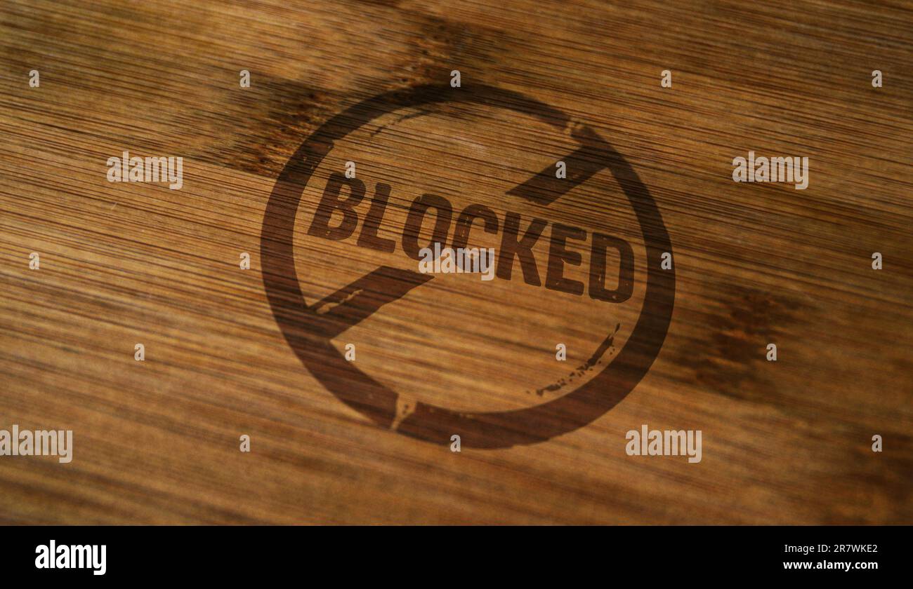 Blocked stamp printed on wooden box. Permitted ban and prohibition concept. Stock Photo