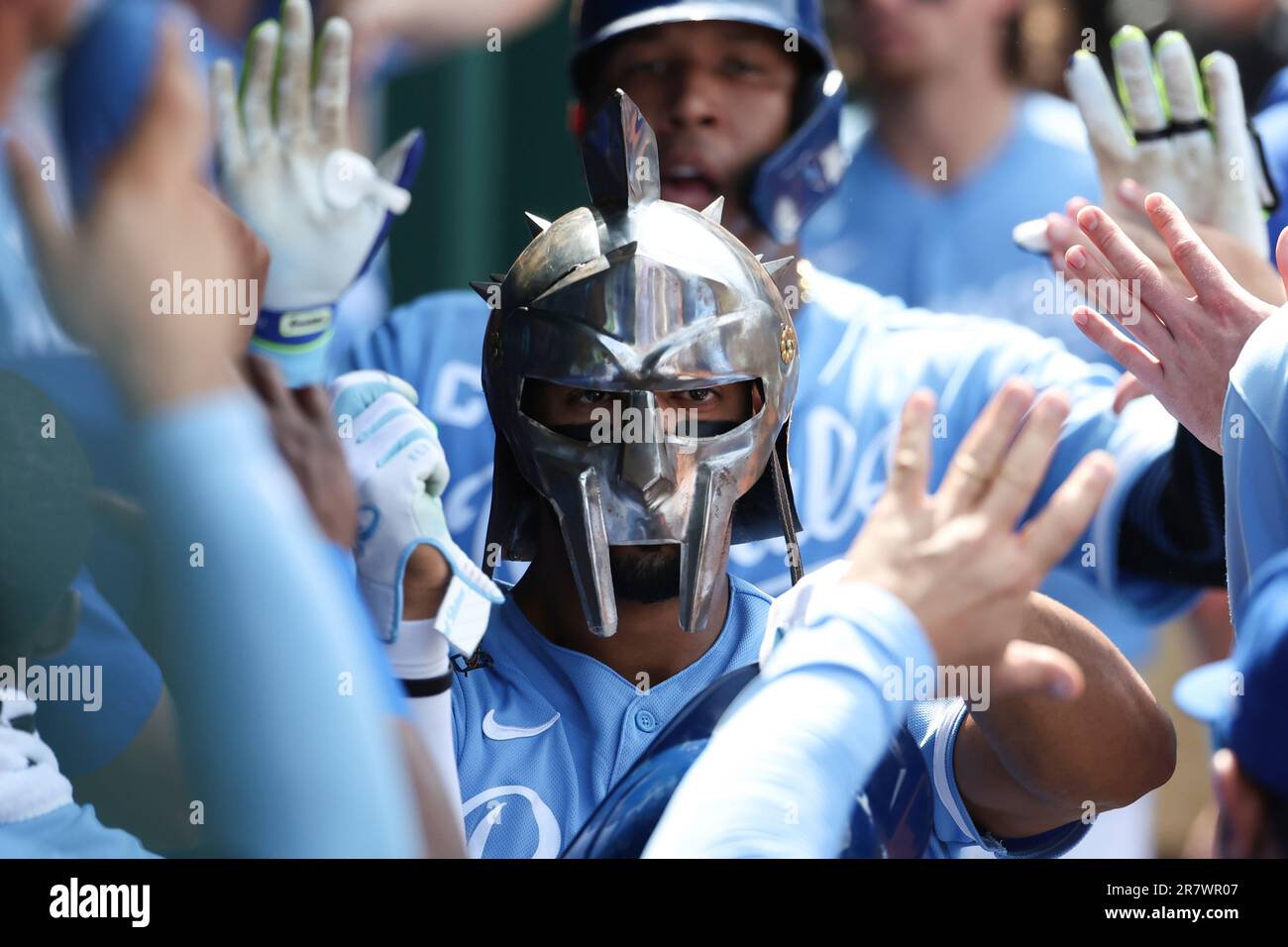 KANSAS CITY, MO - JUNE 17: Kansas City Royals right fielder MJ Melendez (1)  celebrates a 2-run home run in the fourth inning wearing a gladiator helmet  in the dugout of an