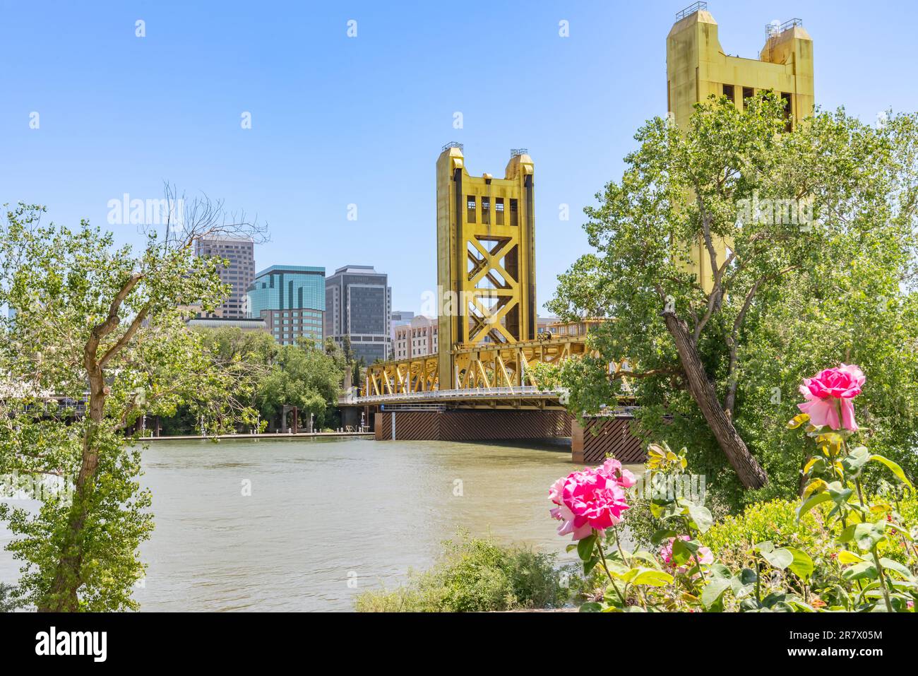 Sacramento, CA - May 25, 2023: City skyline and Tower Bridge of Sacramento from the Riverwalk Trail Stock Photo