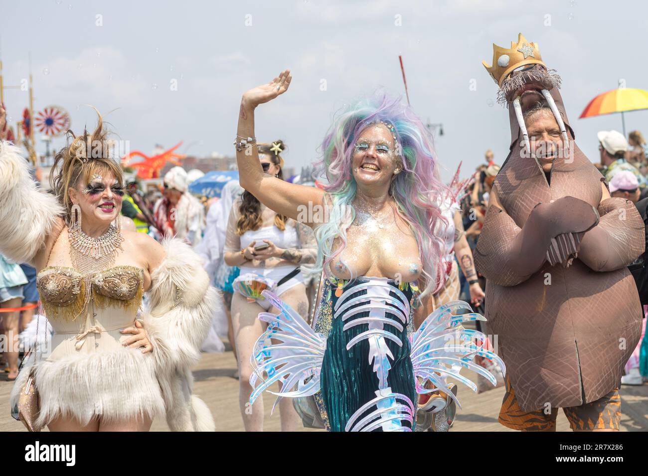 People in a variety of colorful costumes participate in the annual