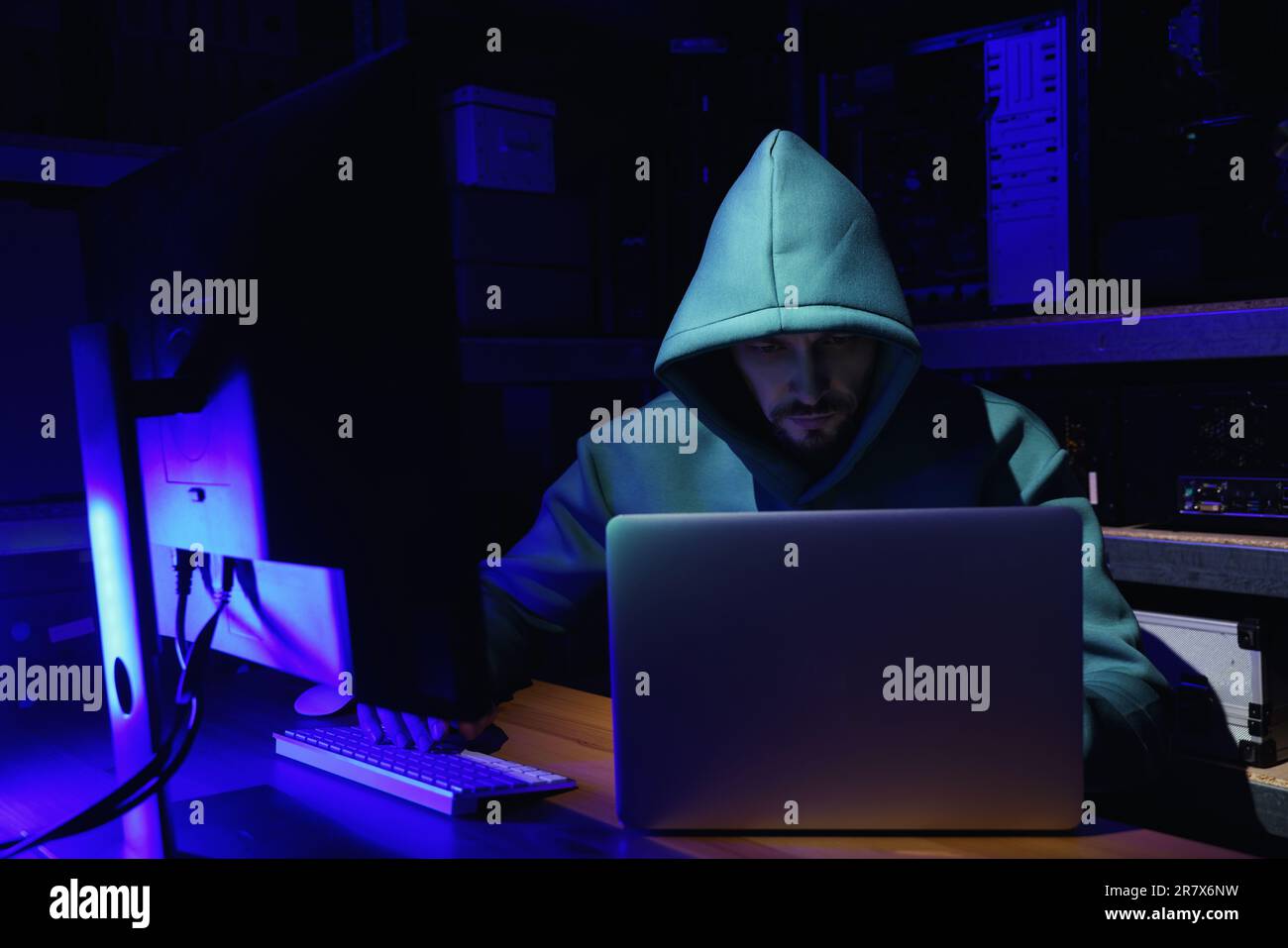 Hacker working with computers in dark room. Cyber attack Stock Photo ...