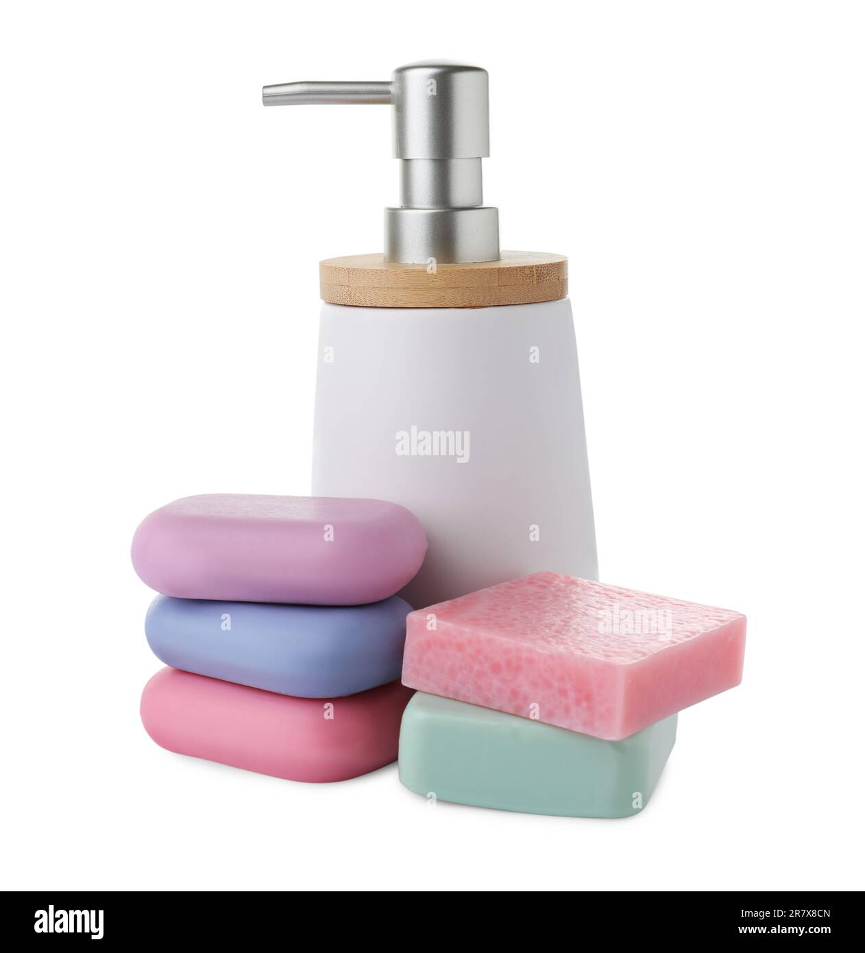 Different soap bars and dispenser on white background Stock Photo