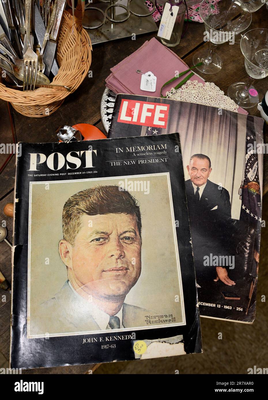 Vintage 1963 issues of The Saturday Evening Post and Life magazine  with John Kennedy an Lyndon Johnson on the covers in an American antique shop. Stock Photo