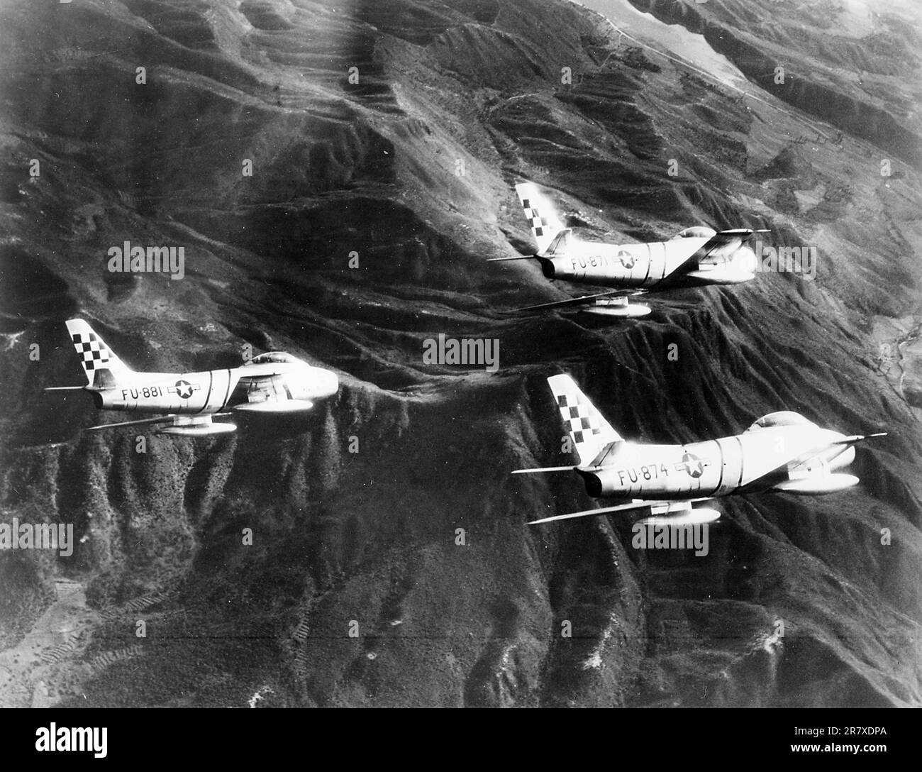 Three F-86 Sabre fighter jets on patrol over Korea during the Korean War. Stock Photo