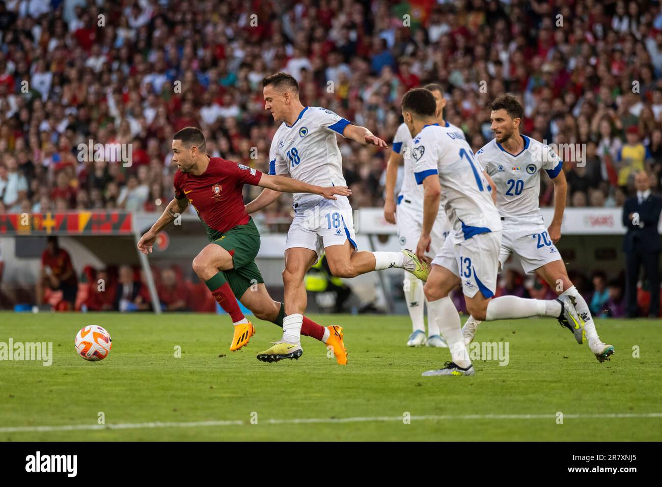 Lisbon, Portugal. 17th June, 2023. Raphael Guerreiro (L) of Portugal in action during the Euro 2024 qualifying match between Portugal and Bosnia Herzegovina at Estadio da Luz Stadium.Final score; Portugal 3:0 Bosnia Herzegovina. (Photo by Hugo Amaral/SOPA Images/Sipa USA) Credit: Sipa USA/Alamy Live News Stock Photo