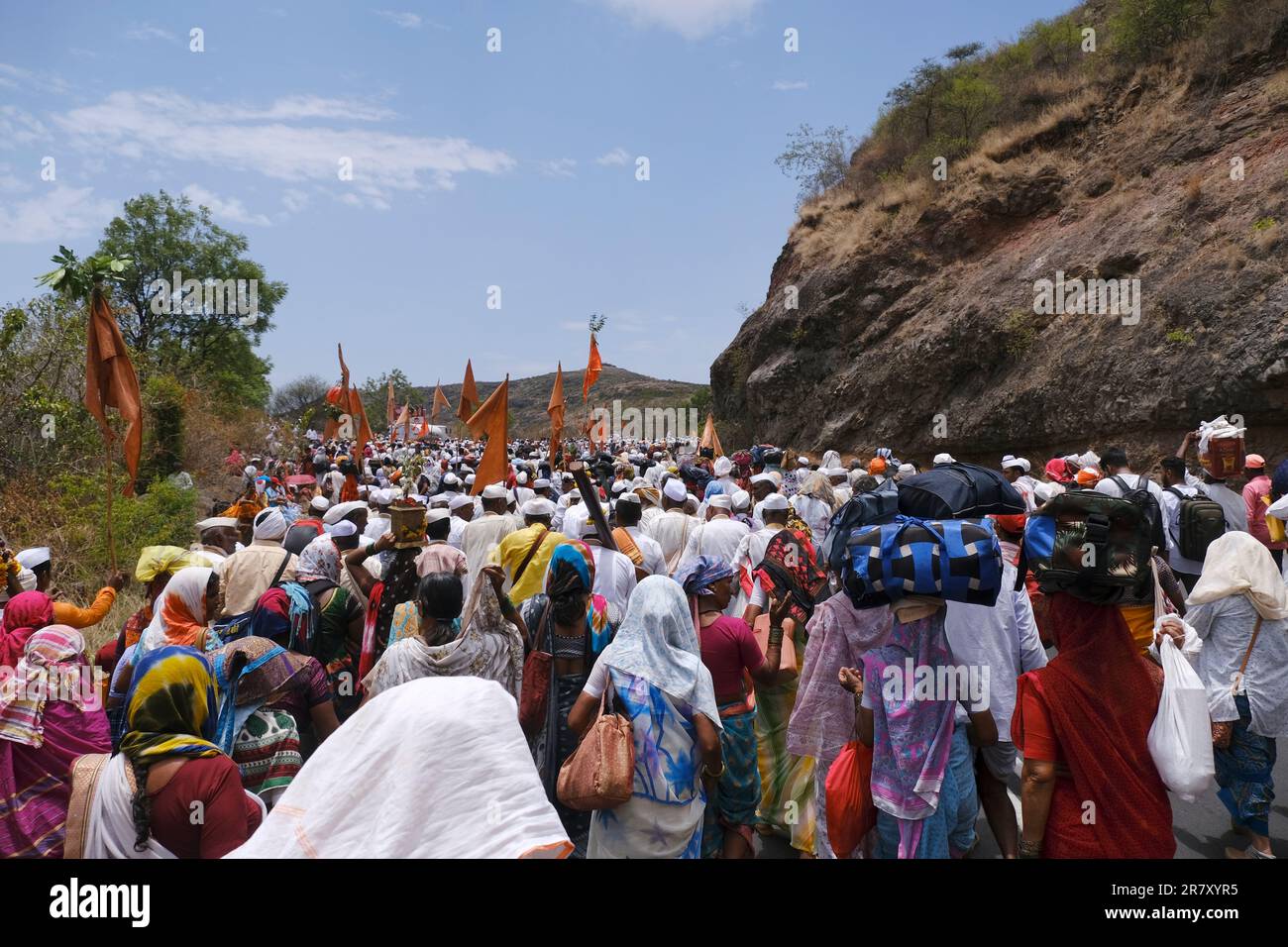 Pune, India 14 July 2023, cheerful Pilgrims at Palkhi, During Pandharpur wari procession Pilgrims marching toward Vitthala temple with singing. Stock Photo