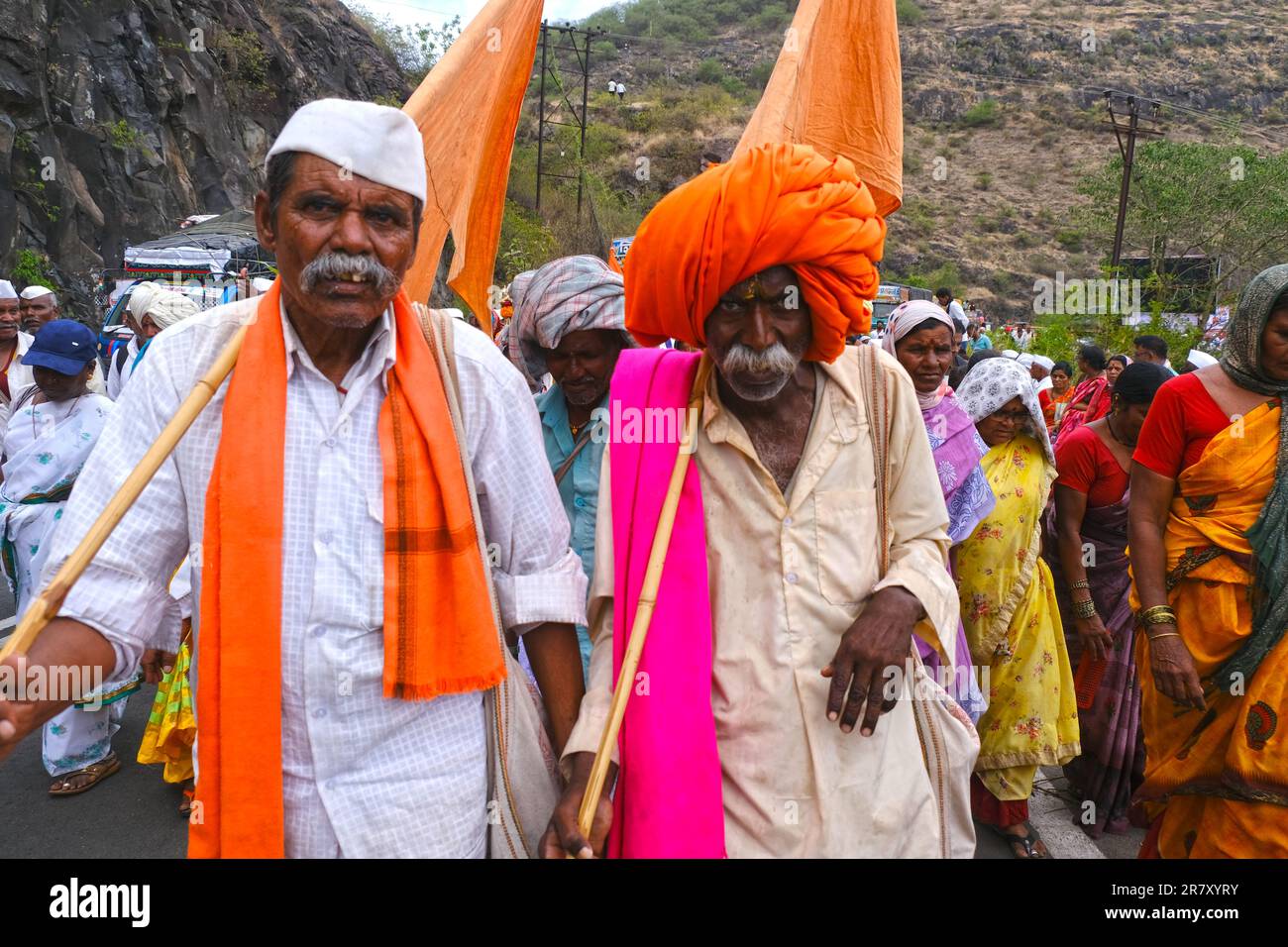 Pune, India 14 July 2023, cheerful Pilgrims at Palkhi, During Pandharpur wari procession Pilgrims marching toward Vitthala temple with singing. Stock Photo