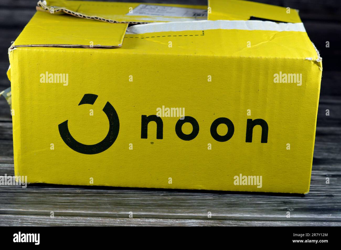 Cairo, Egypt, June 12 2023 Noon online shopping delivery yellow box