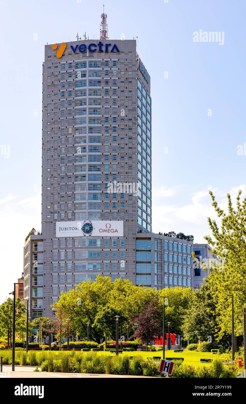 Warsaw, Poland - June 4, 2023: Babka Tower residential and office project at 80 Jana Pawla II avenue and Rondo Radoslawa roundabout in Wola business d Stock Photo
