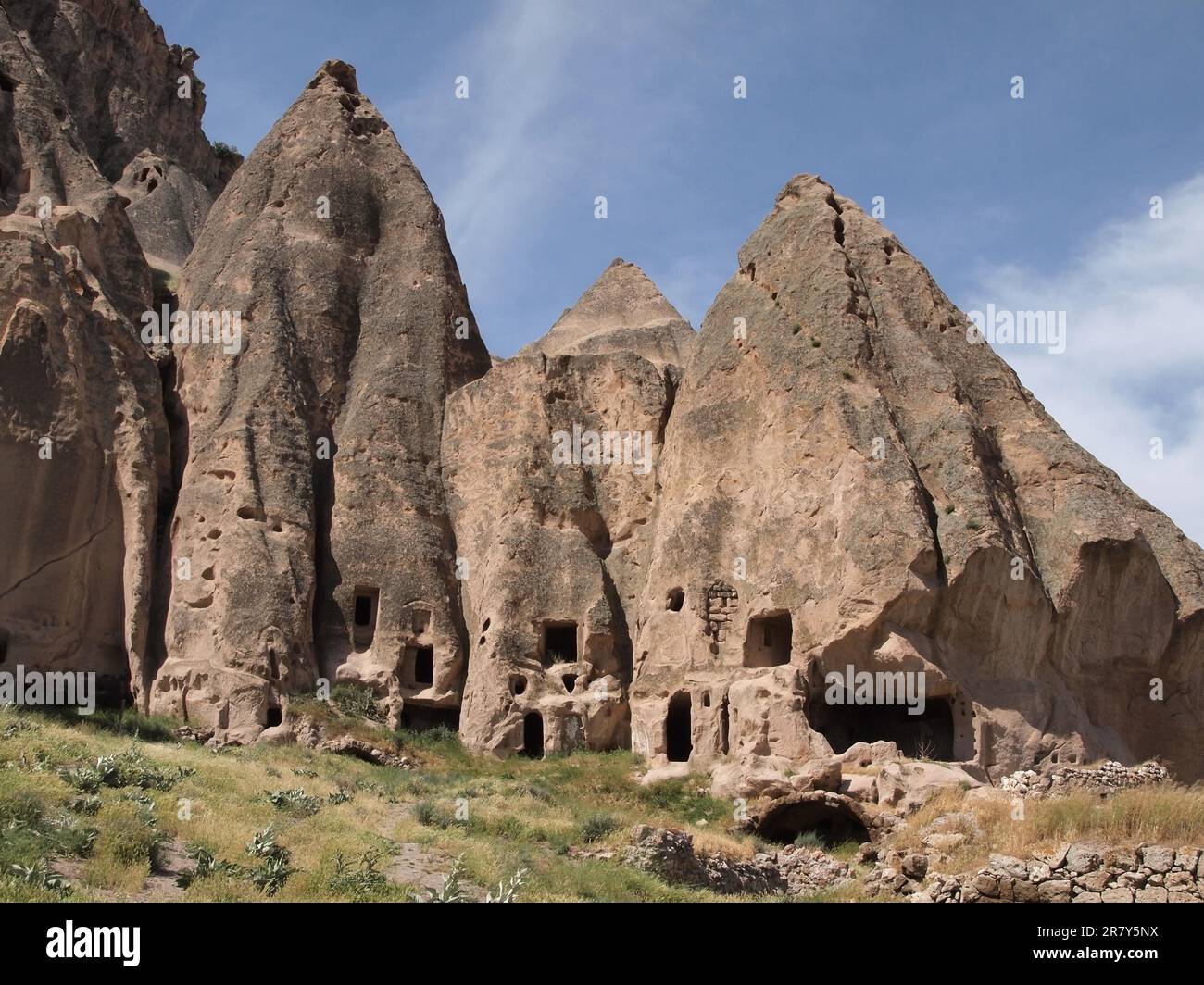 Bizarre rock formations and cave dwellings in Cappadocia, Turkey Stock Photo