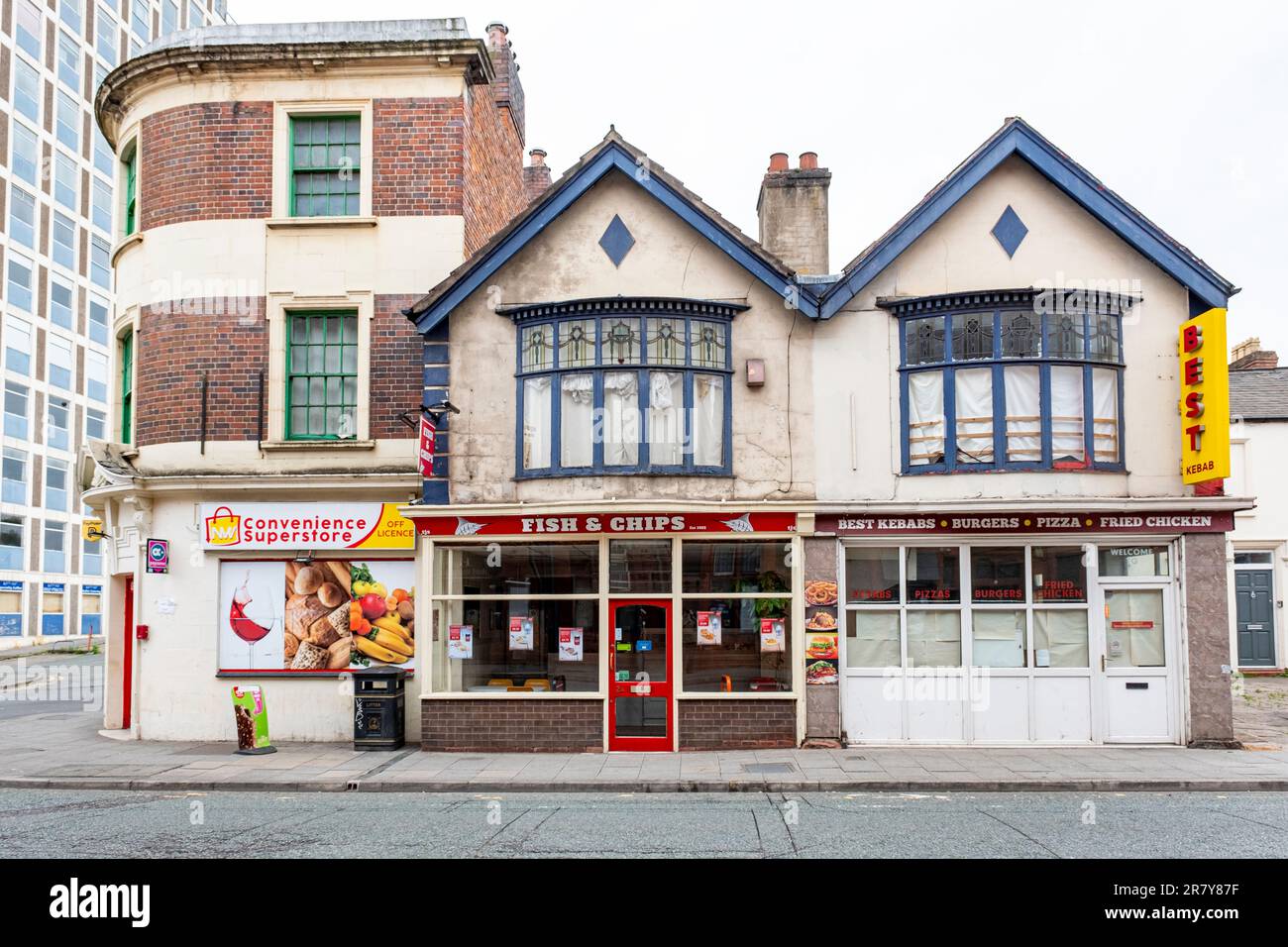 Convenience store with takeaways on Nantwich Road in Crewe Cheshire UK Stock Photo
