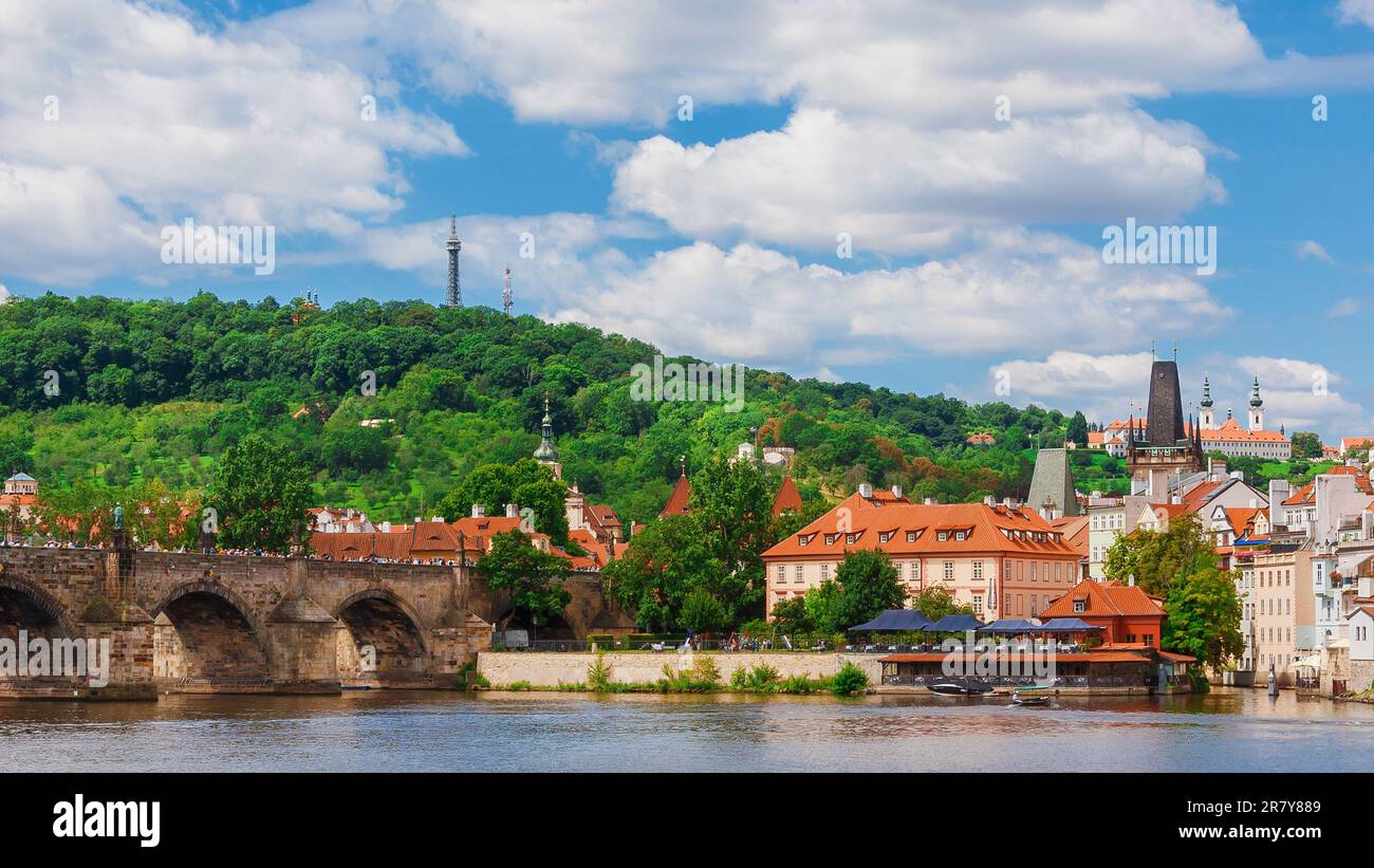 View of Prague Mala Strana old district and River Vltava with the famous Charles Bridge and Petrin Hill Stock Photo