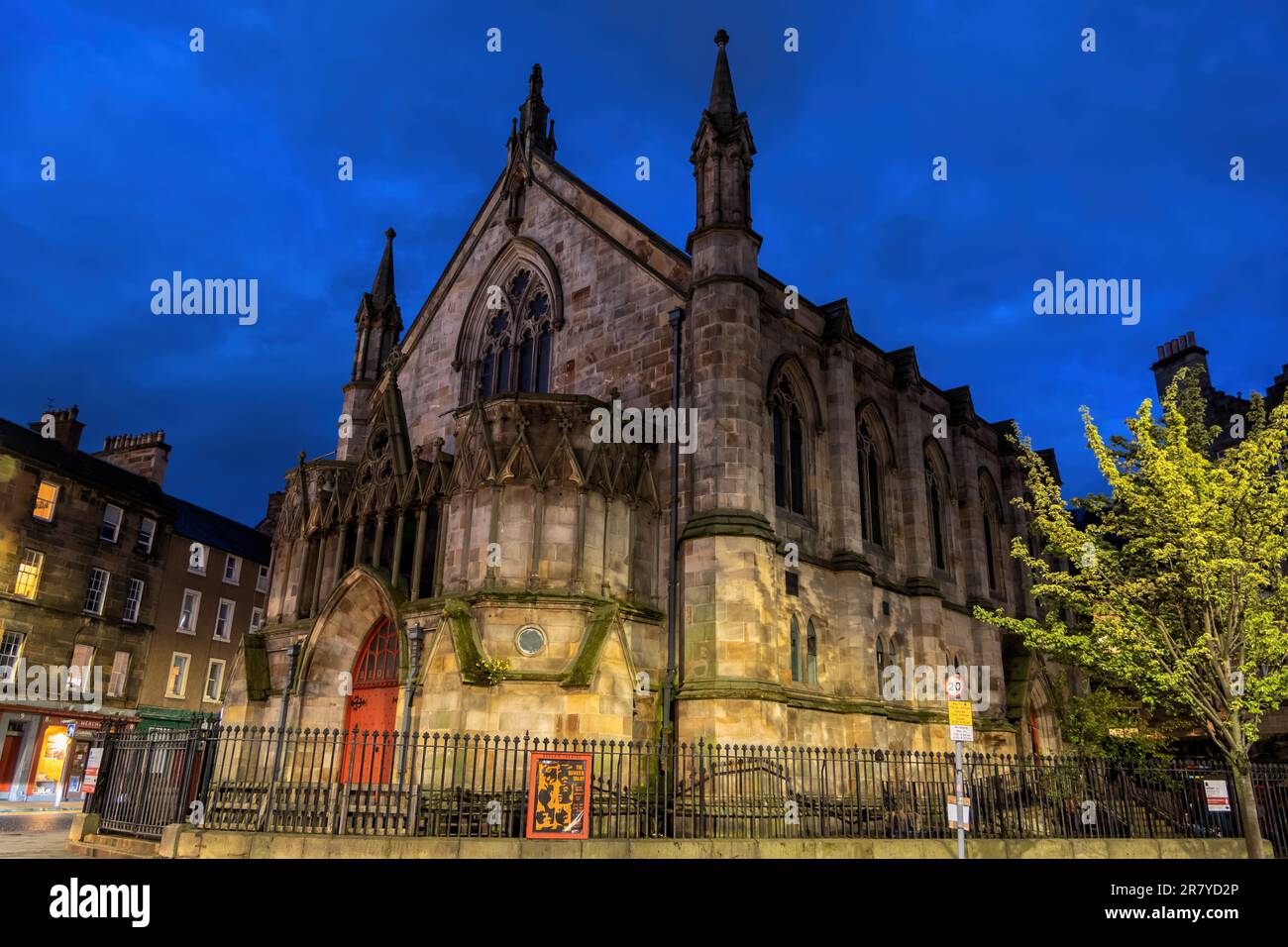 Bedlam Theatre at night in the Old Town of Edinburgh, Scotland. Former New North Free Church building from 1848, designed in Decorated Gothic style by Stock Photo