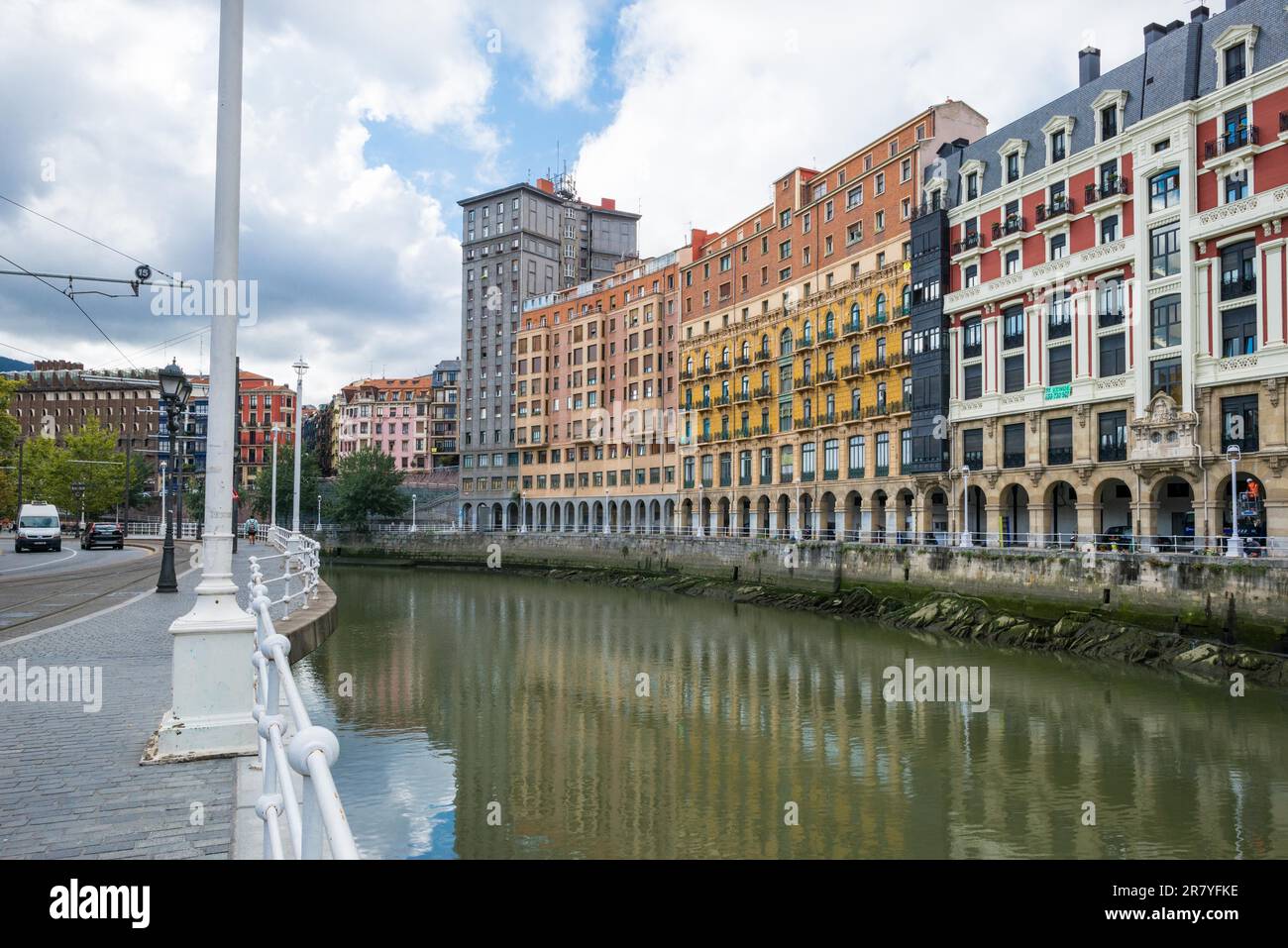 House facades in Bilbao along the Nervion river that runs through the city into the Cantabrian Sea. The apartment blocks are situated in the Stock Photo