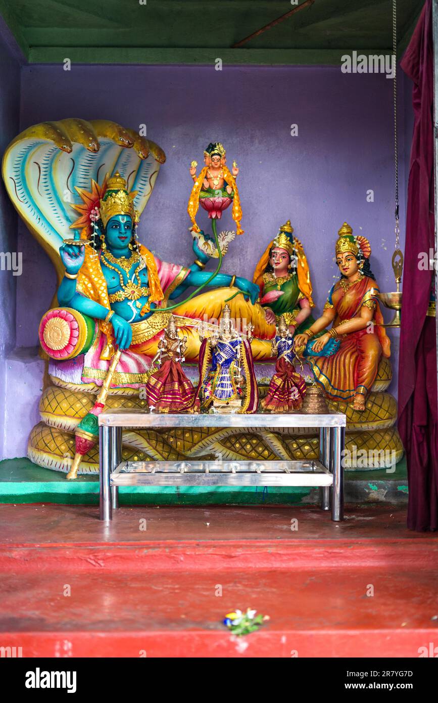 Shrine of Shiva with statuettes and portrait of the deity in the Hindu temple in Matale in the Central Province of Sri Lanka Stock Photo
