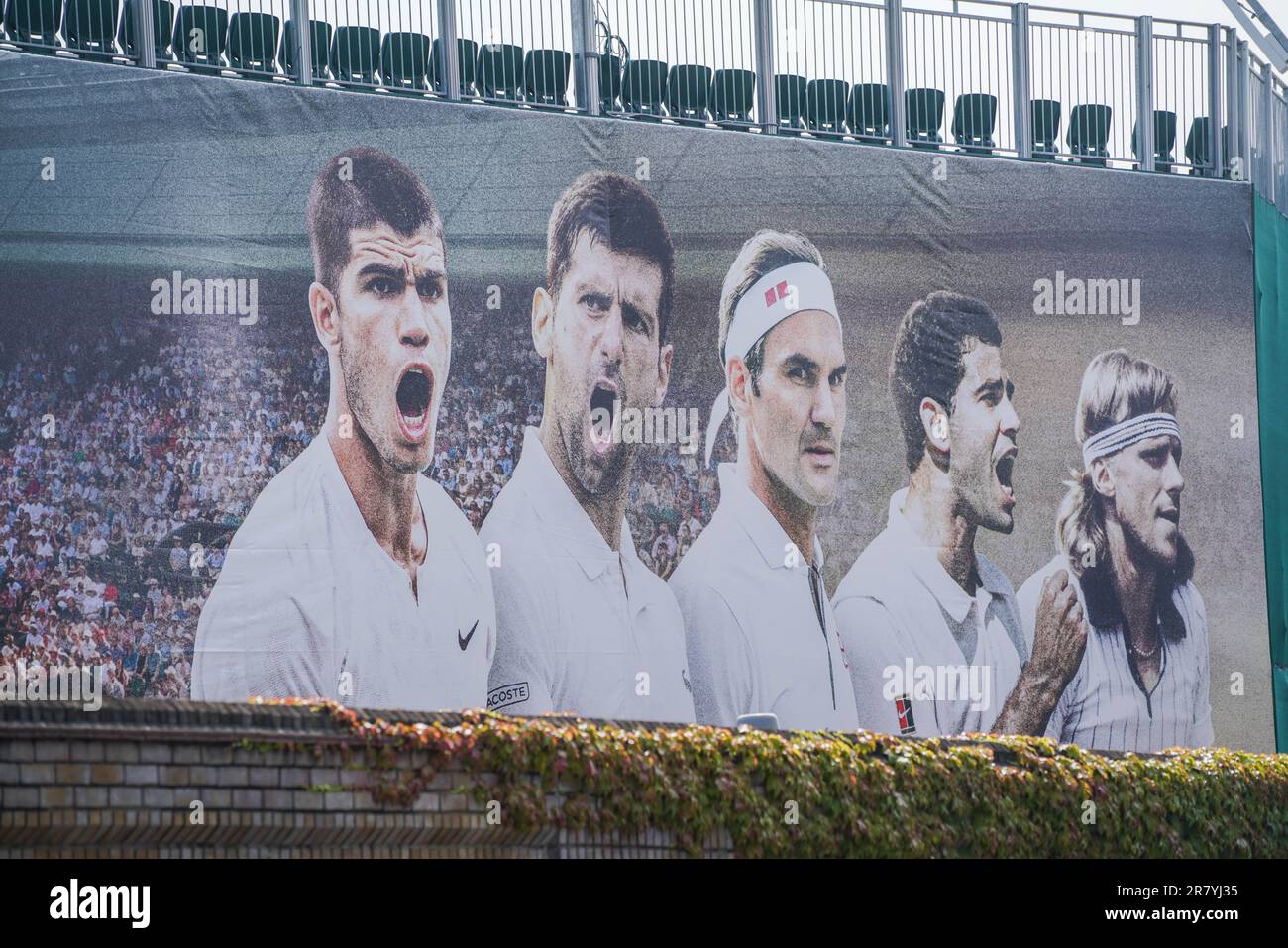 London UK. 18 June 2023 .A spectator stand covered with images of present and past Wimbledon champions , Carlos Alcaraz,Novak Djokovic,  Roger Federer, Pete Sampras  and Bjorn Borg   with over two weeks until the start of the Wimbledon, championships Grand Slam tournament which begins on 3 July  . Credit: amer ghazzal/Alamy Live News Stock Photo