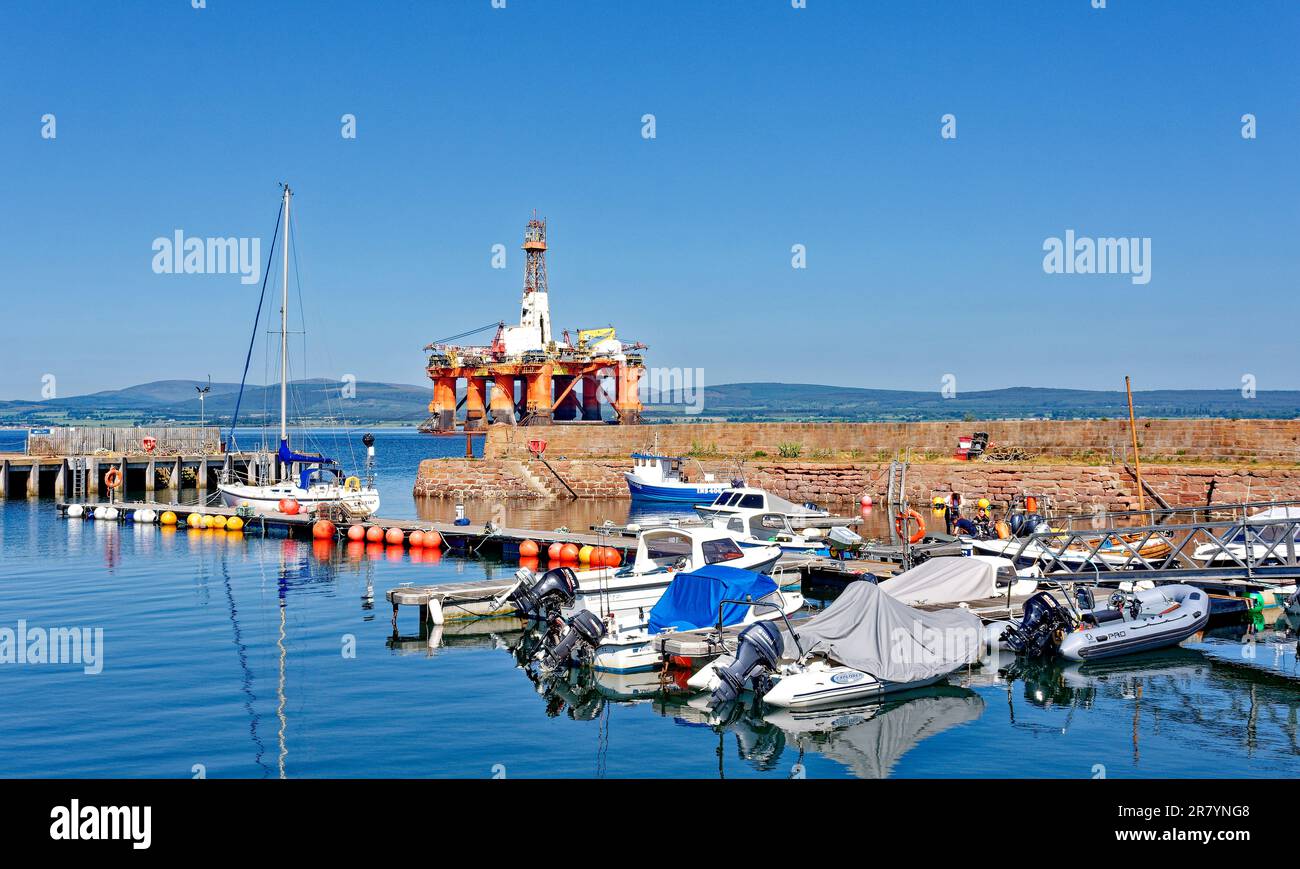 Cromarty Town Scotland the small harbour with a yacht boats and large ...