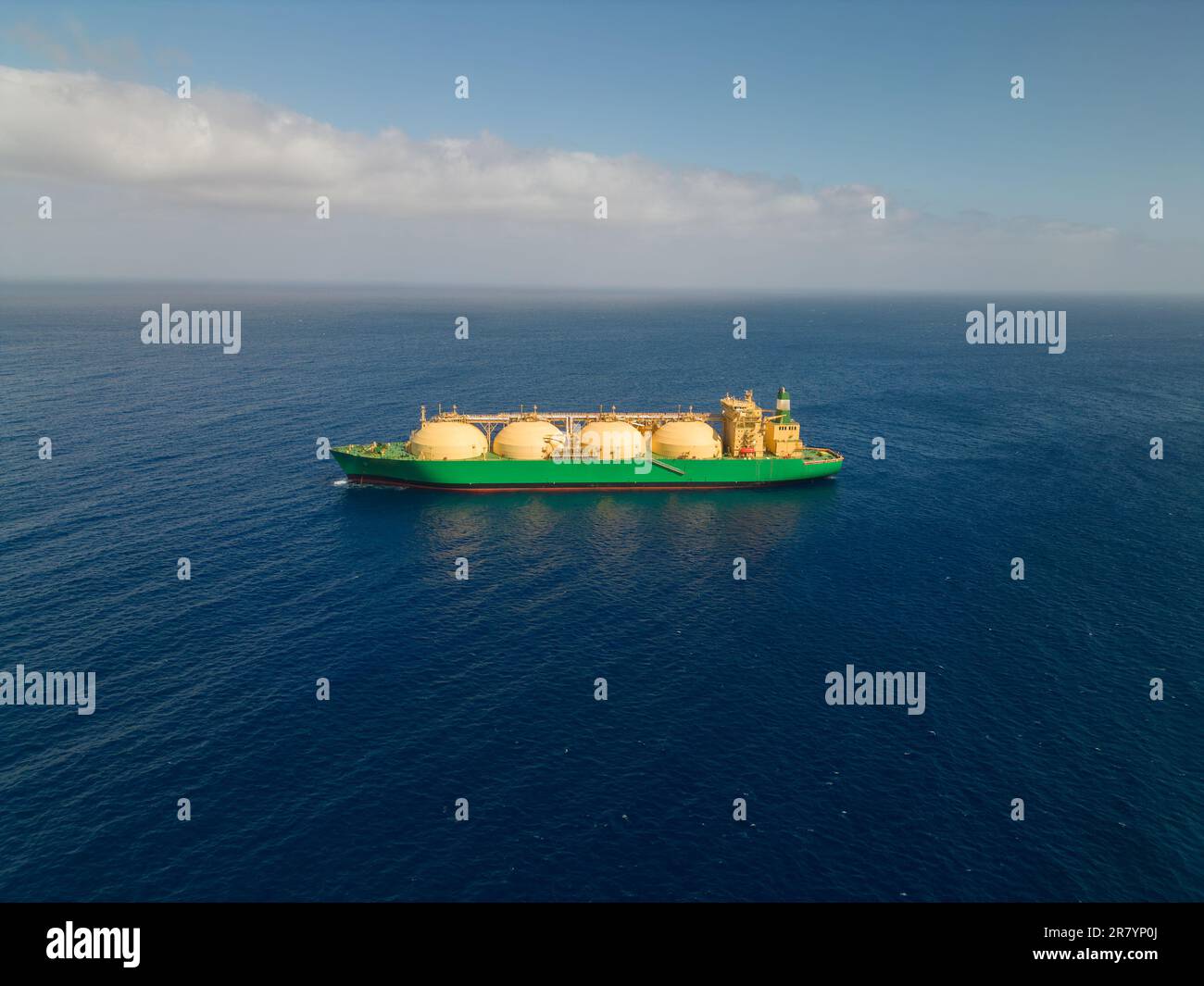 tanker ship with liquid natural gas transporting fuel in open sea