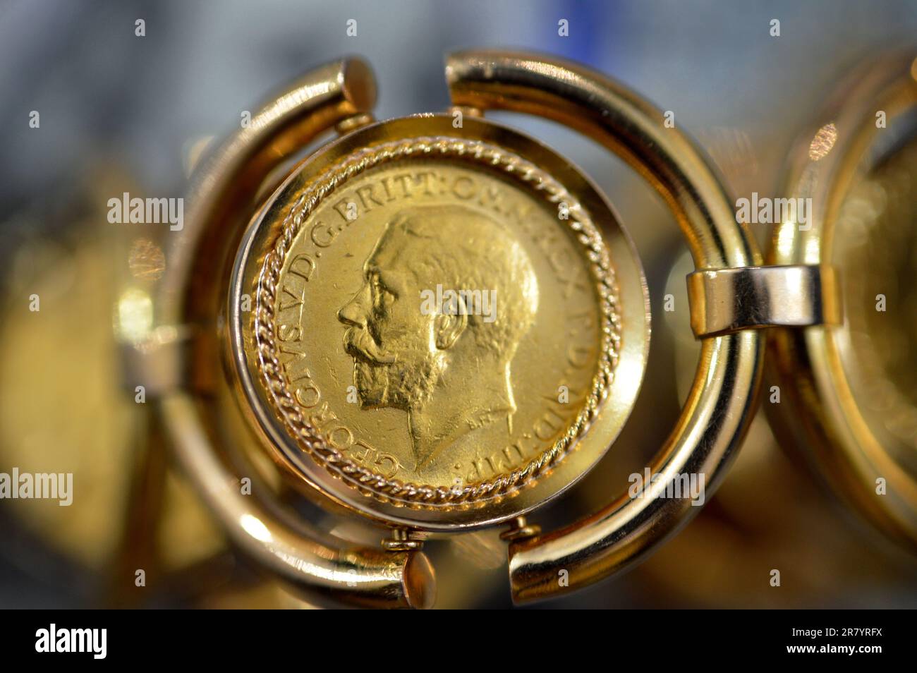 The sovereign is a British gold coin shape with a nominal value of one pound sterling, a bullion coin and is sometimes mounted in Jewellery with the d Stock Photo