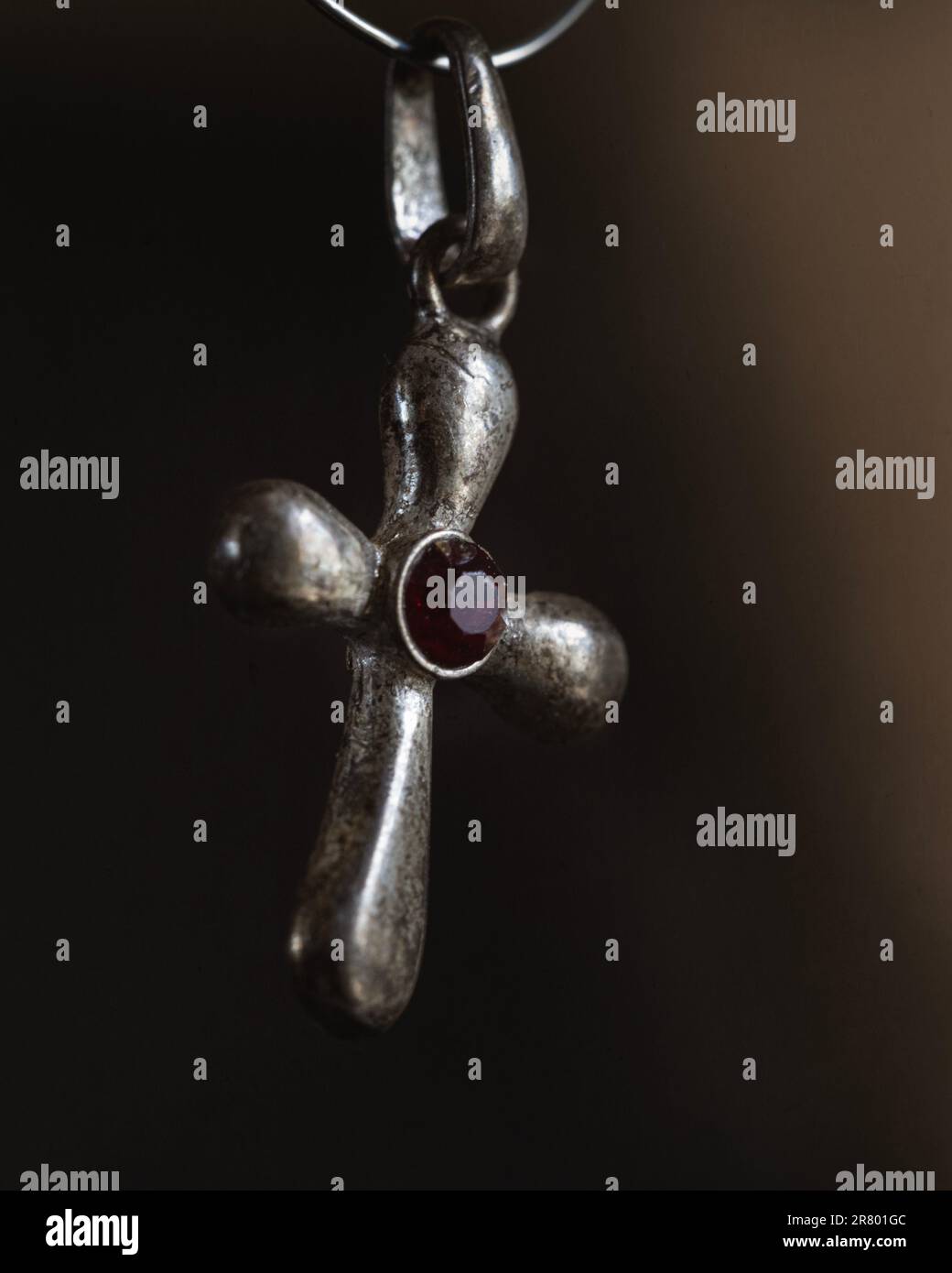 small silver cross pendant from the 1970s gifted as a Christening gift