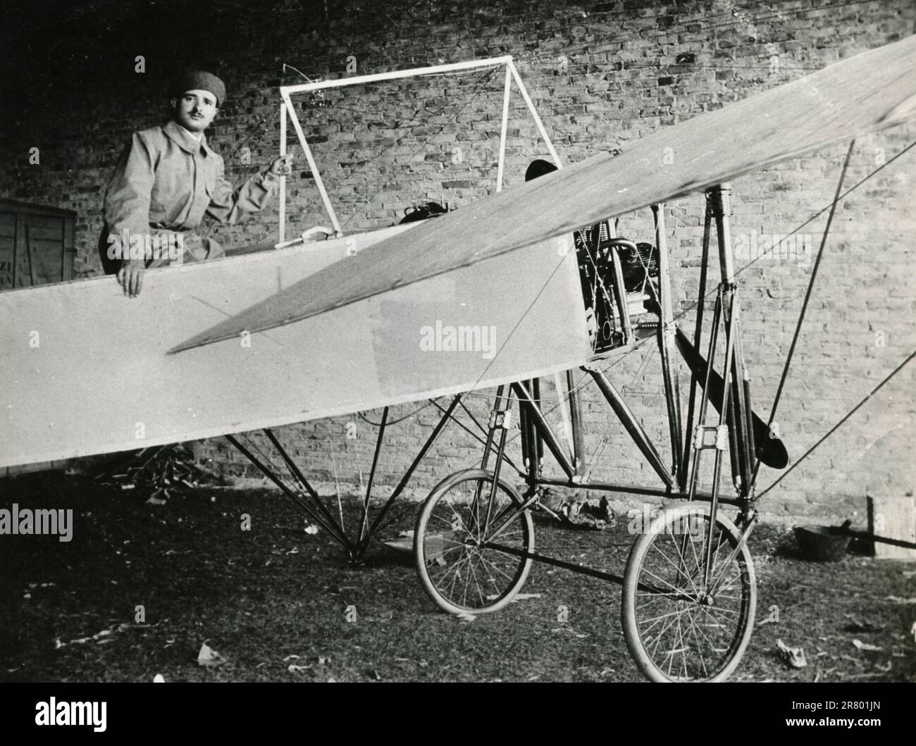 Italian aviator Cpt. Leopoldo De Rada over French aircraft Helios-Bleriot, Pordenone, Italy 1911 Stock Photo
