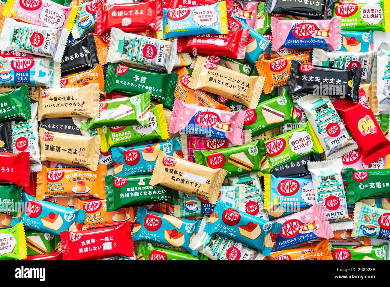 Assorted pile of various flavour Japanese minibar kitkats. Various