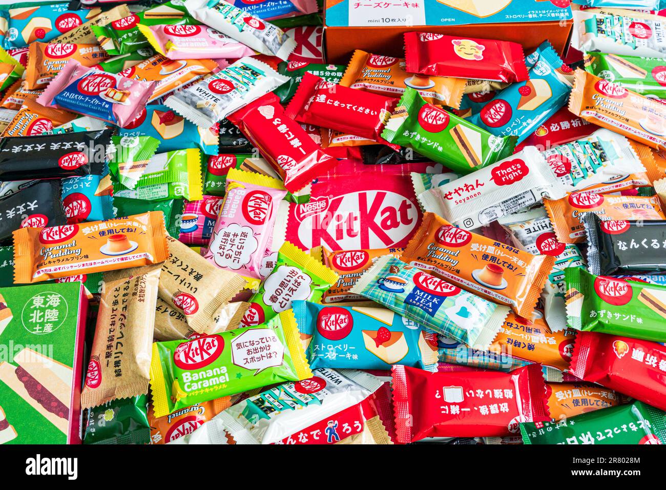 Assorted pile of various flavour Japanese minibar kitkats. Various